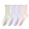 Women's 4-Pair Pack Soft Ribbed Ankle Socks with Ruffled Edge Trim Lightweight Knit Design in Multiple Color Combinations