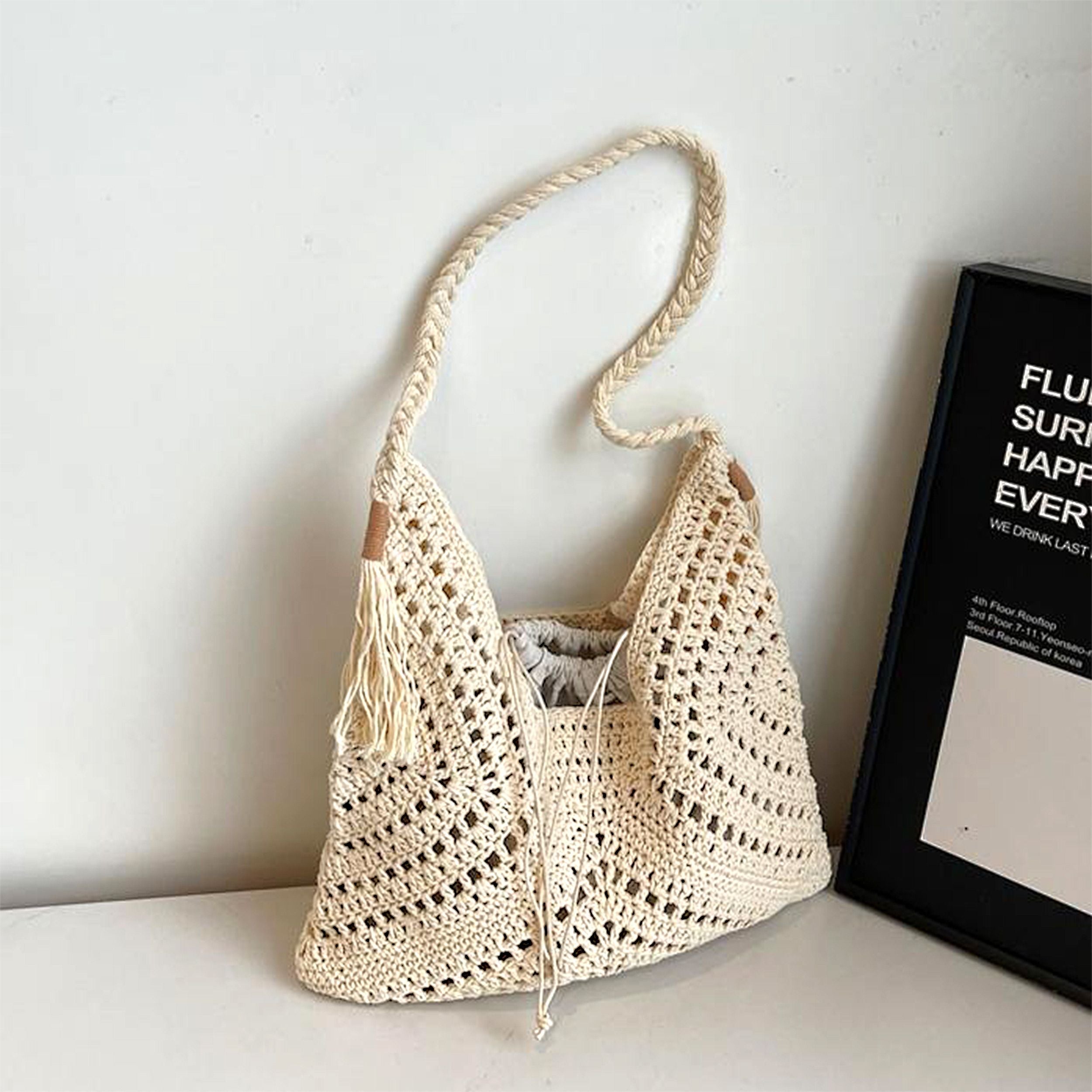 Woven Crochet Hobo Shoulder Bag with Tassel Detail Soft Knit Slouchy Tote Drawstring Style