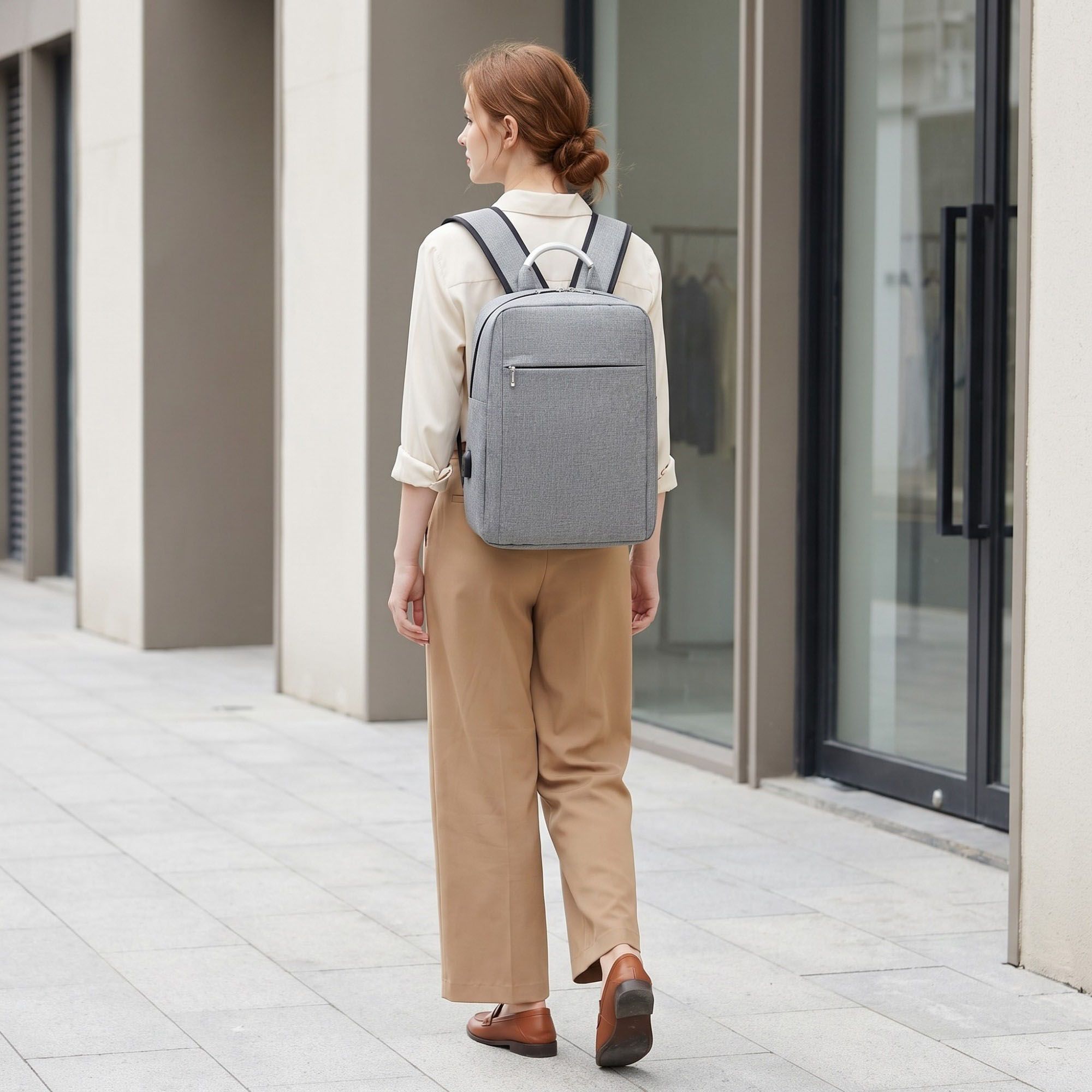 Modern Business Laptop Backpack - Sleek Commuter Daypack with Metallic Handle for Office, School, and Travel