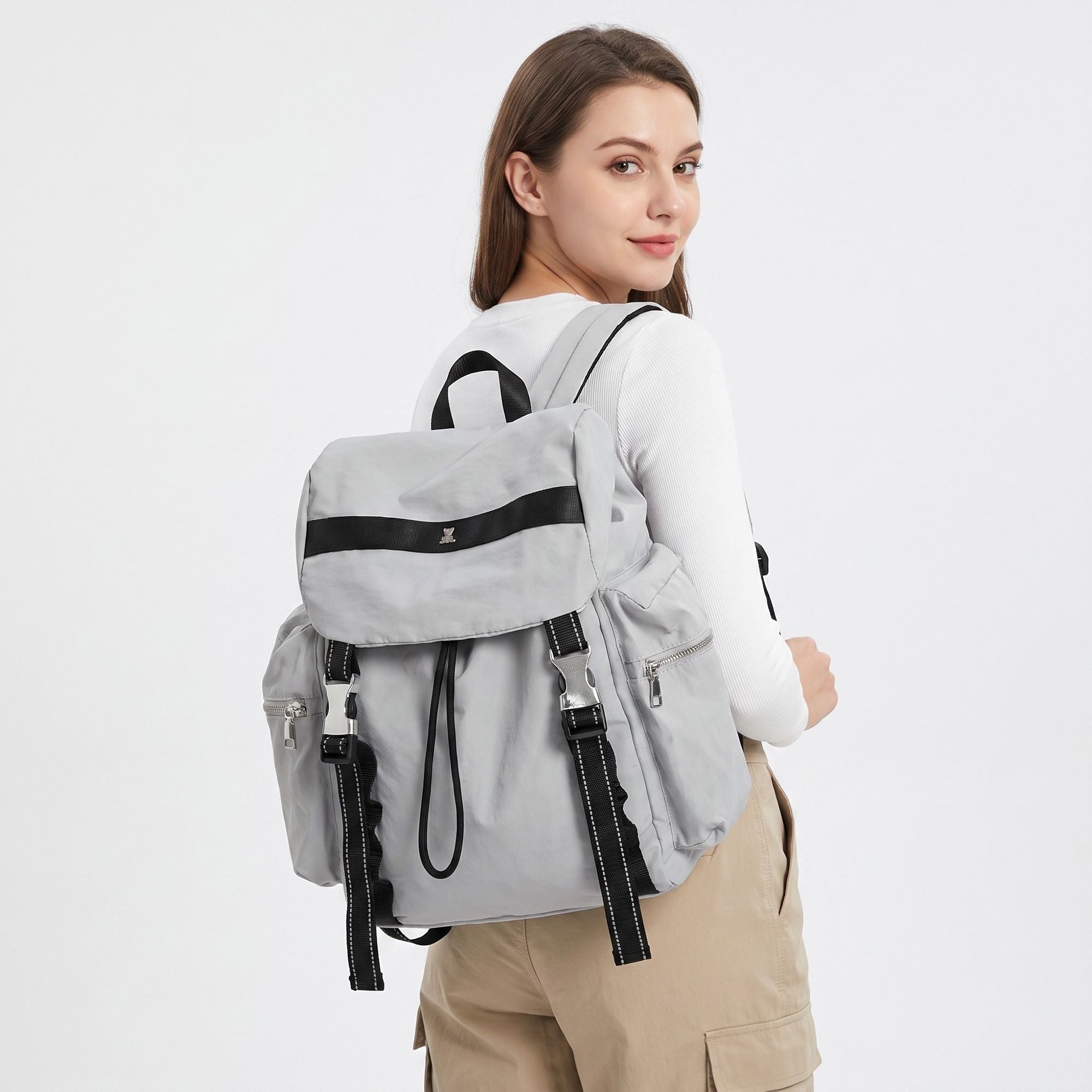 Flap Drawstring Backpack with Dual Buckle Straps and Zippered Side Pockets