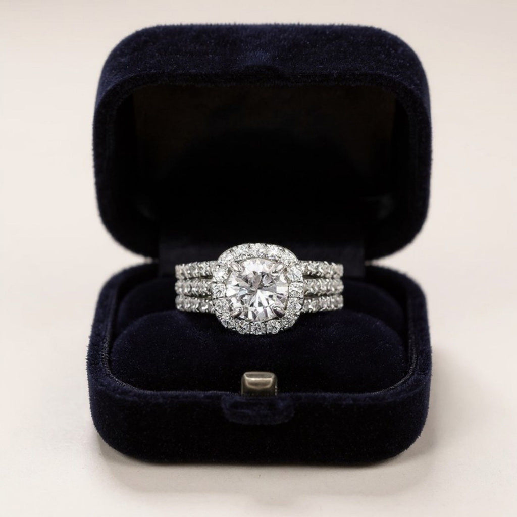Women's Cushion Halo Engagement Ring with Round Cut Center Stone and Triple Band Design