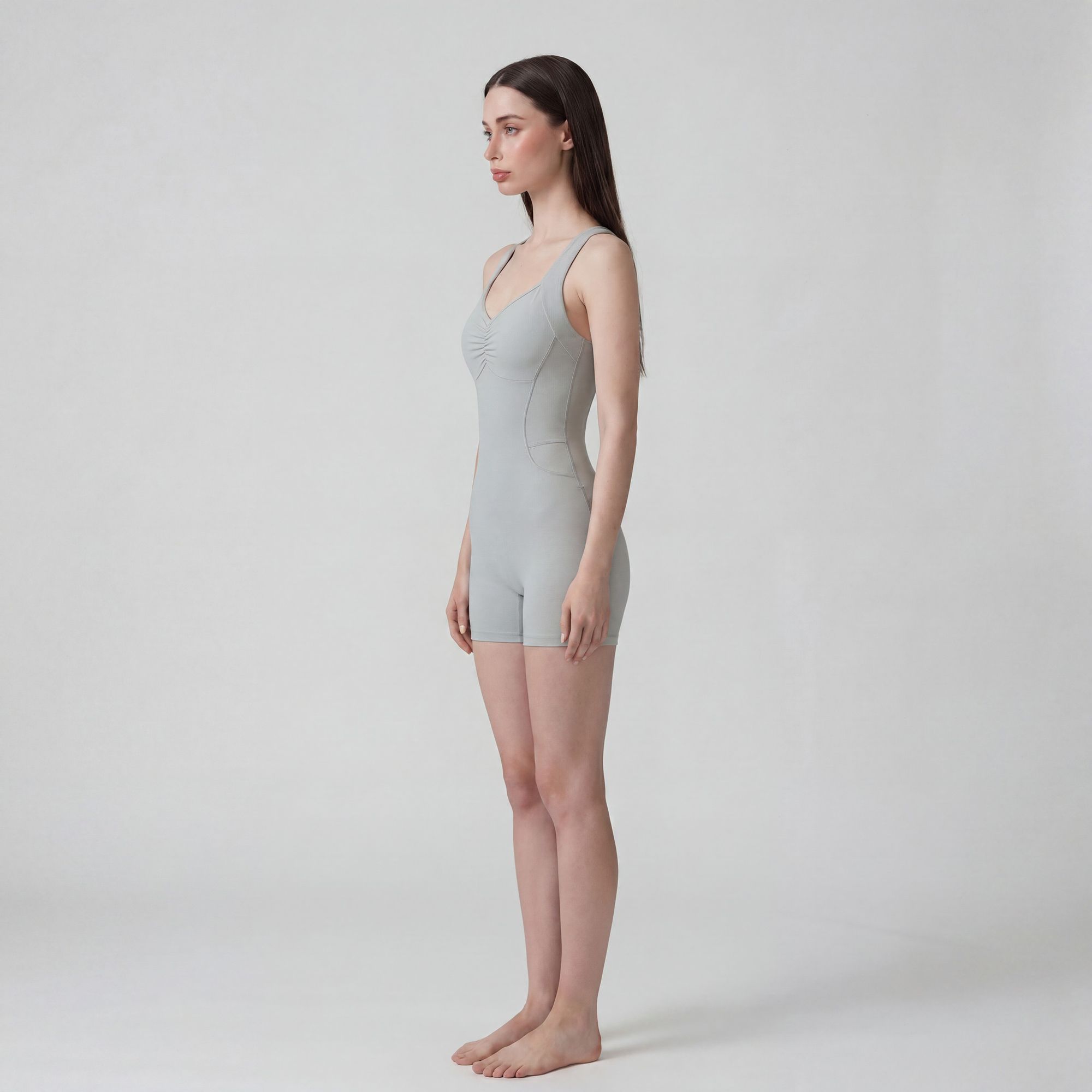 Sleeveless Active Romper with Cross Back Straps Ruched Bust Contour Seams and Fitted Shorts