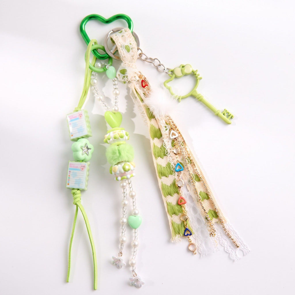 Multi-Element Bag Charm with Hanging Strap and Decorative Accents