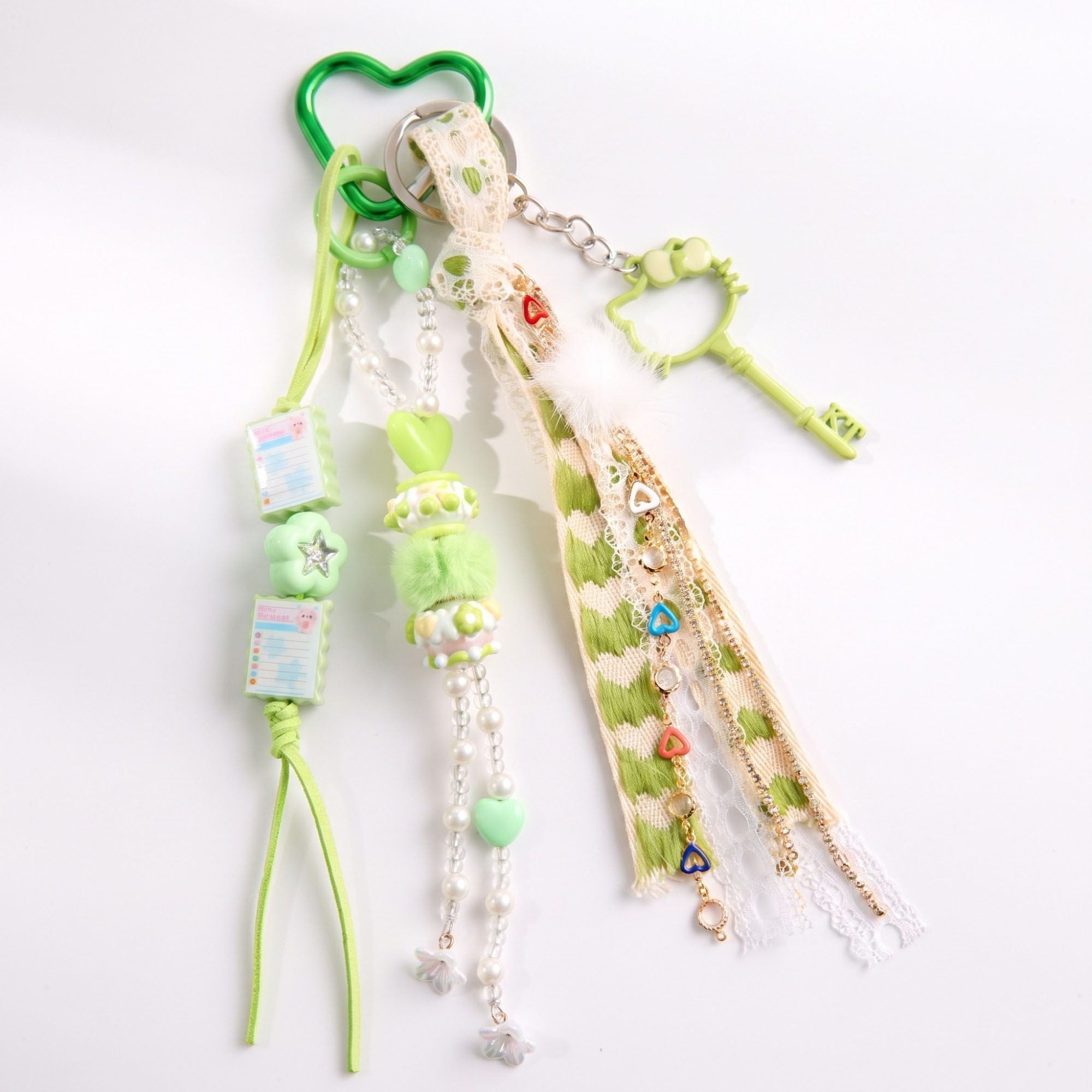 Multi-Element Bag Charm with Hanging Strap and Decorative Accents