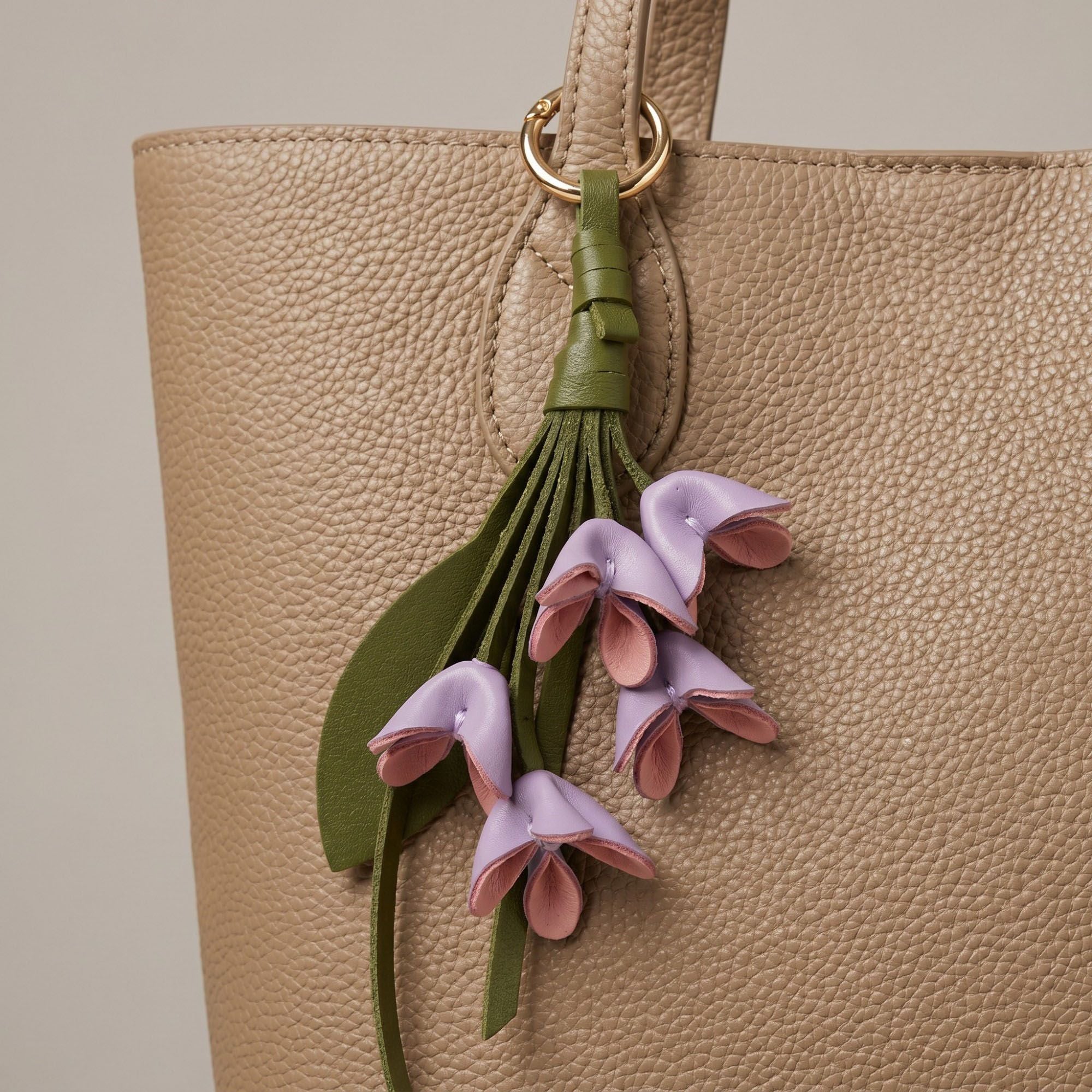 Floral Bag Charm with Tassel Strap and Gold Tone Ring