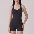 Sleeveless Active Romper with Cross Back Straps Ruched Bust Contour Seams and Fitted Shorts