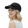Gray women's baseball cap with bow and a polished look