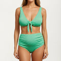 Pink women's bikini set with ribbed, ribbed texture and high-waisted bottoms