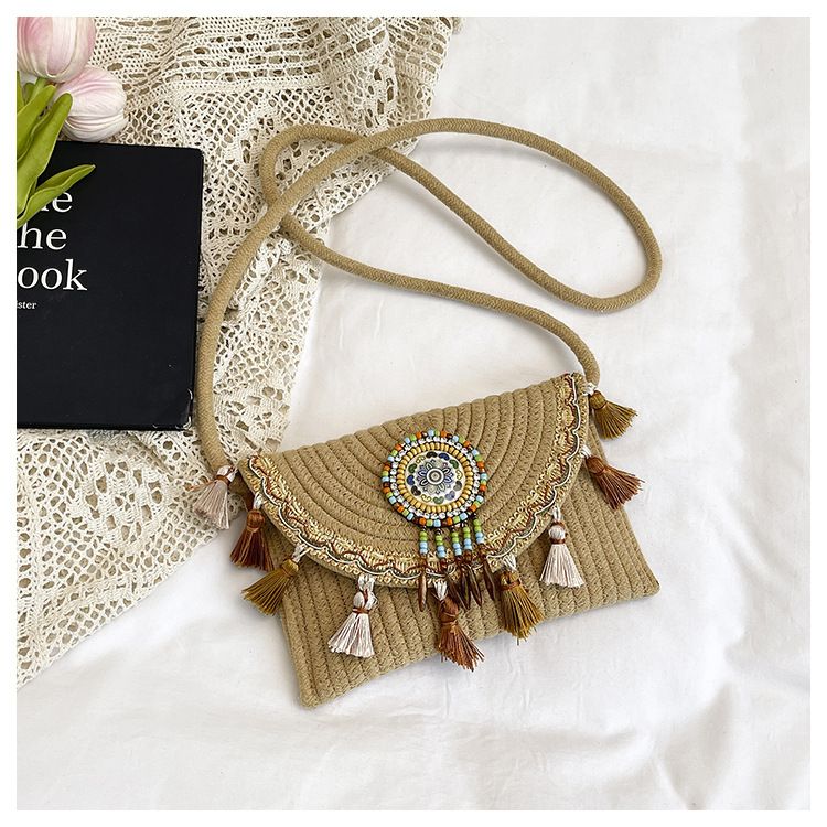 Women's Woven Crossbody Bag with Beaded Medallion Tassel Flap and Long Strap