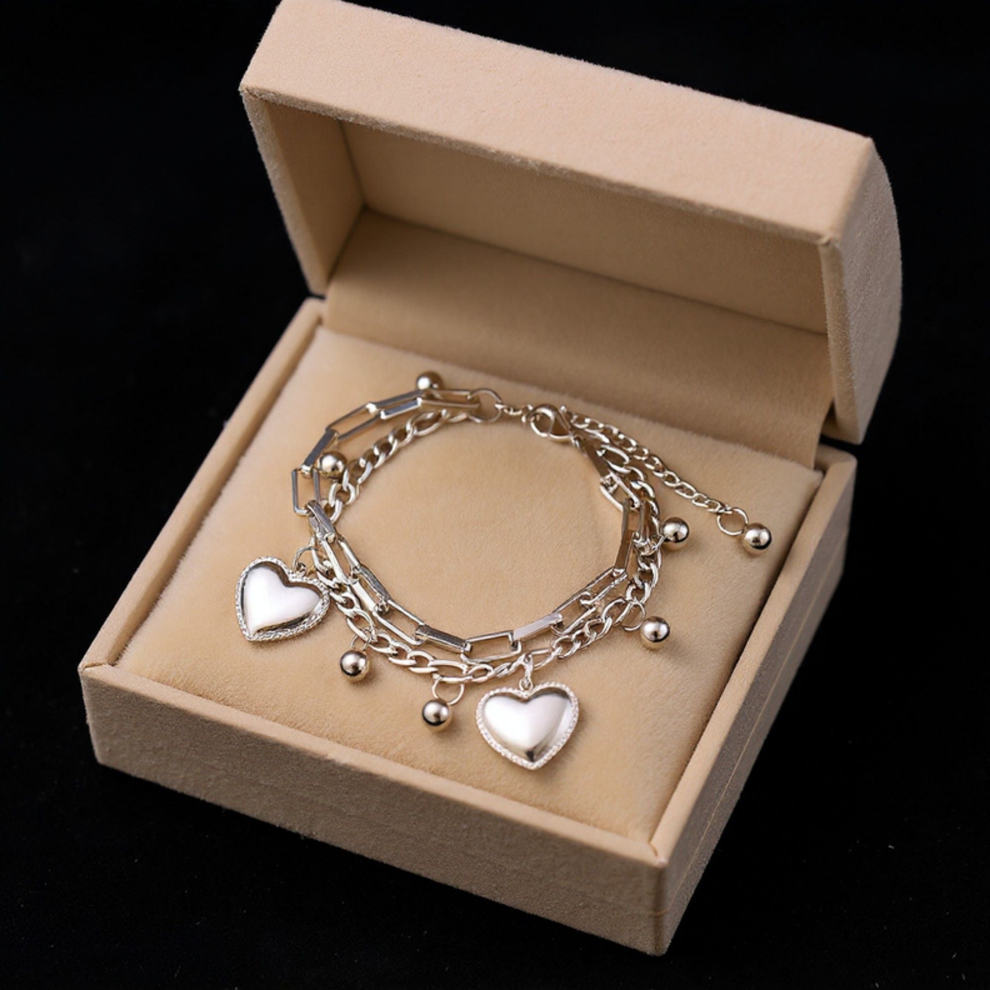Layered Chain Bracelet with Dual Heart Charms and Dangling Bead Accents for a Playful Feminine Accessory with Modern Detail
