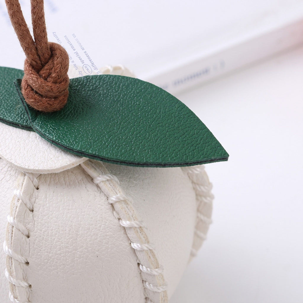 2-Piece Womens Faux Leather Bag Charm with Cord Loop Leaf Accent and Textured Stitch Detail