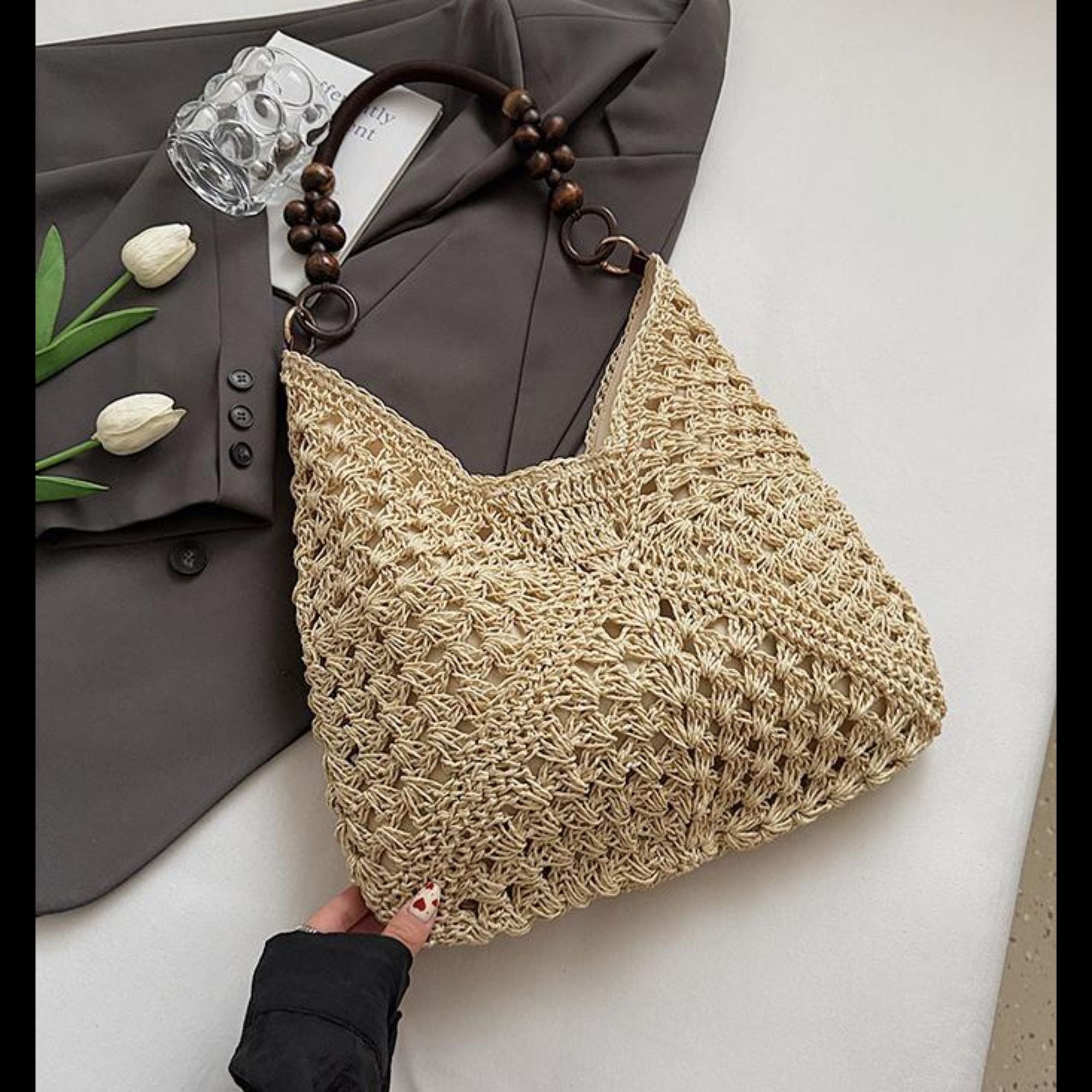 Woven Straw Hobo Bag with Wooden Handle Bead Accents and Spacious Interior