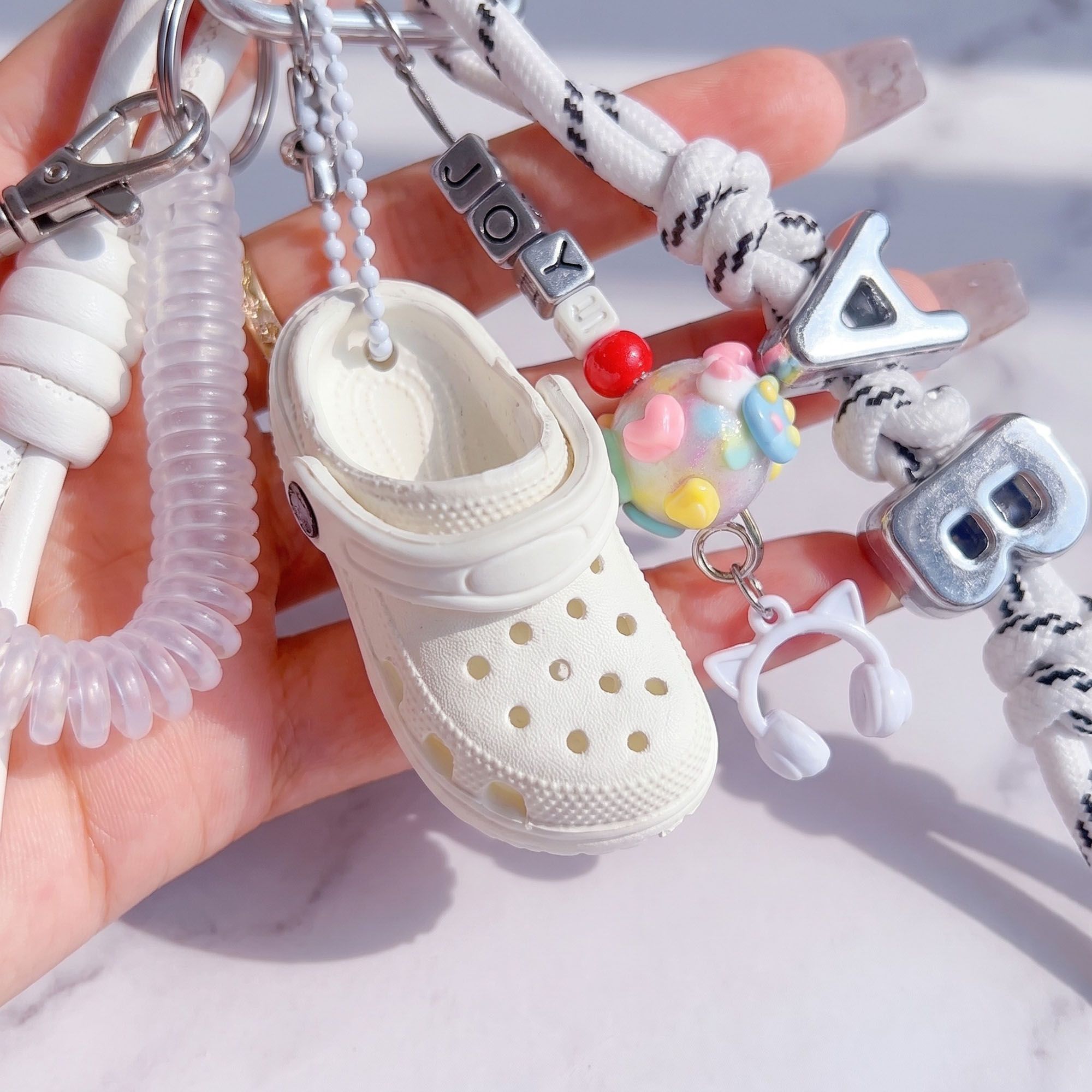 Multi-Charm Accessory with Hanging Clip and Letter Accents