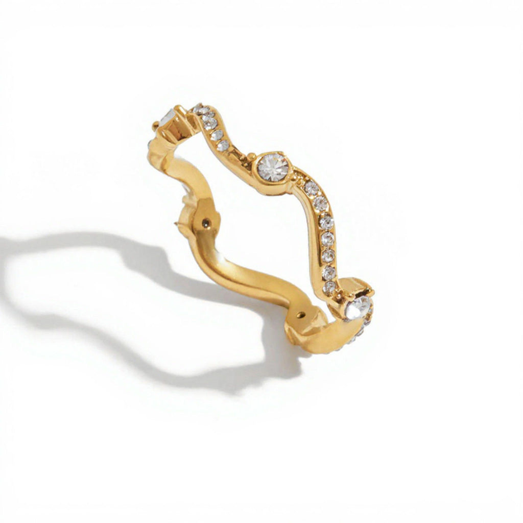 Women's Wavy Band Ring with Delicate Sparkling Accents and Sleek Polished Metal Design