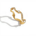 Women's Wavy Band Ring with Delicate Sparkling Accents and Sleek Polished Metal Design