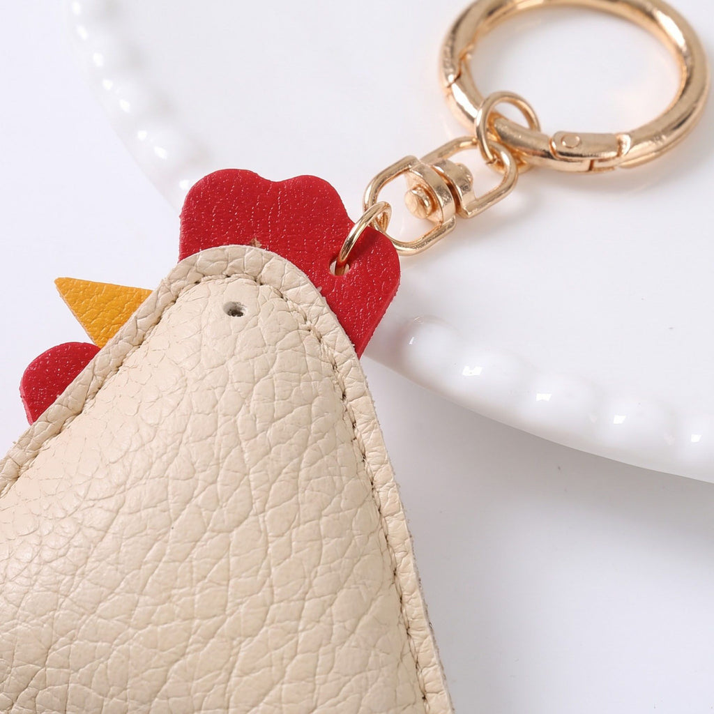 2-Piece Womens Faux Leather Padded Bag Charm with Gold Ring and Stitched Texture