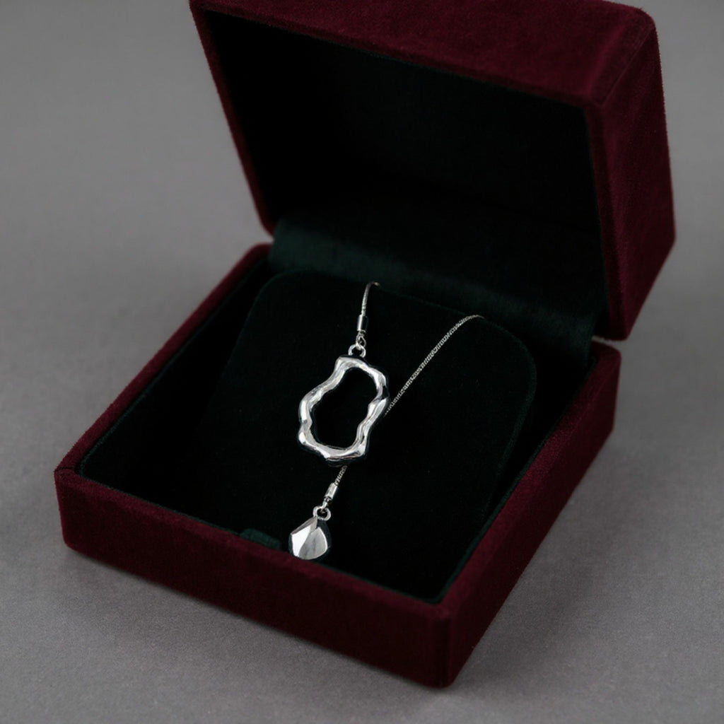 Women's Abstract Drop Pendant Necklace with Fluid Open Frame Design