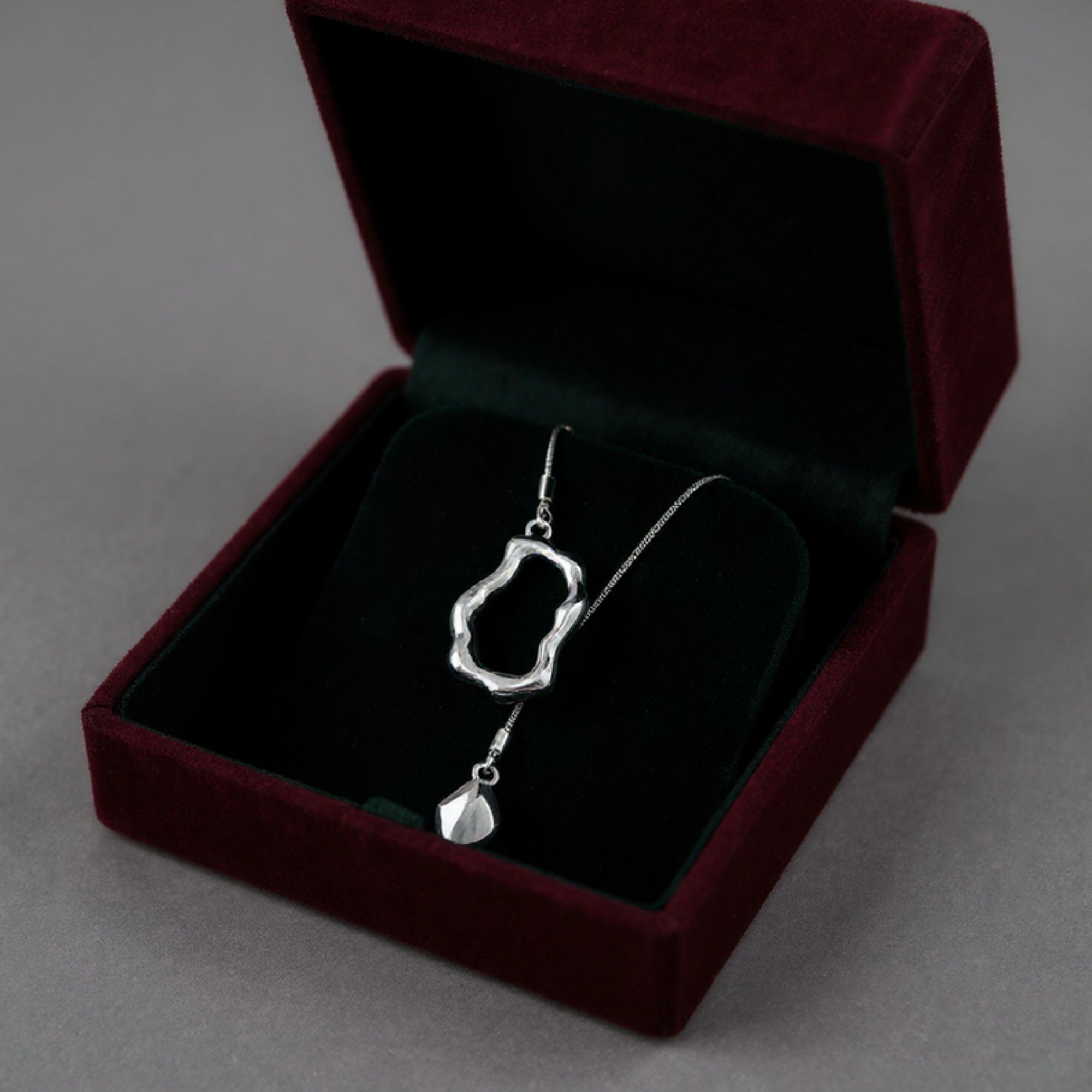 Women's Abstract Drop Pendant Necklace with Fluid Open Frame Design