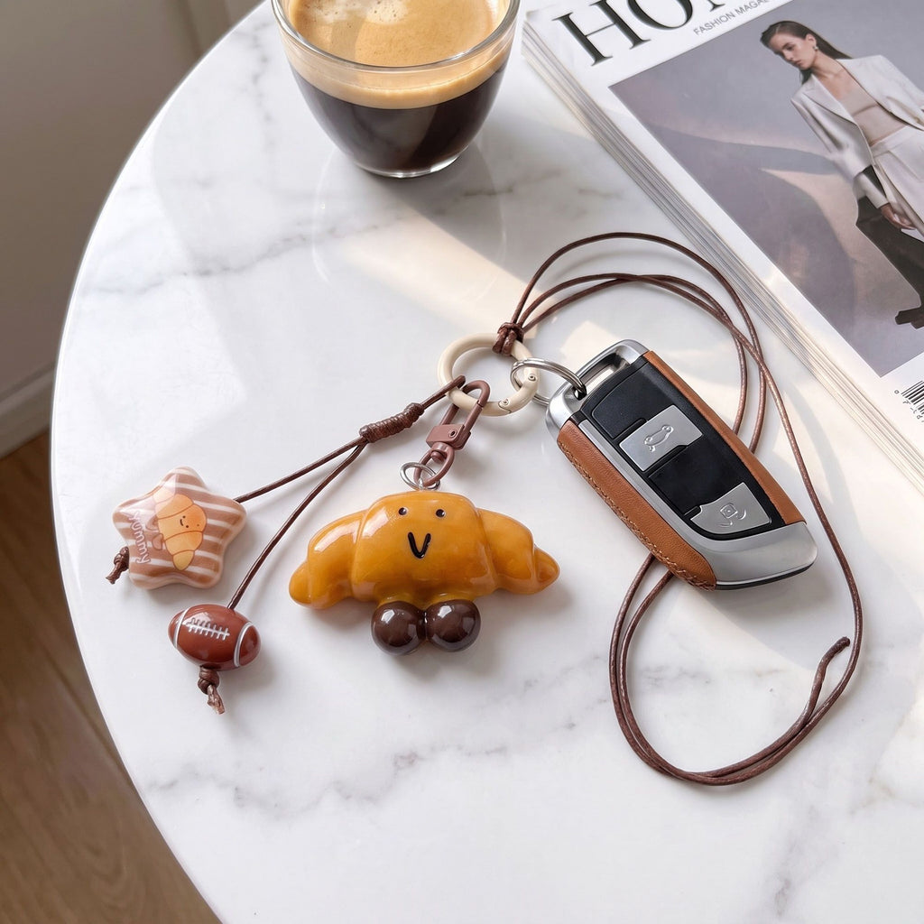 2-Piece Womens Multi-Charm Accessory with Hanging Clip and Character Design