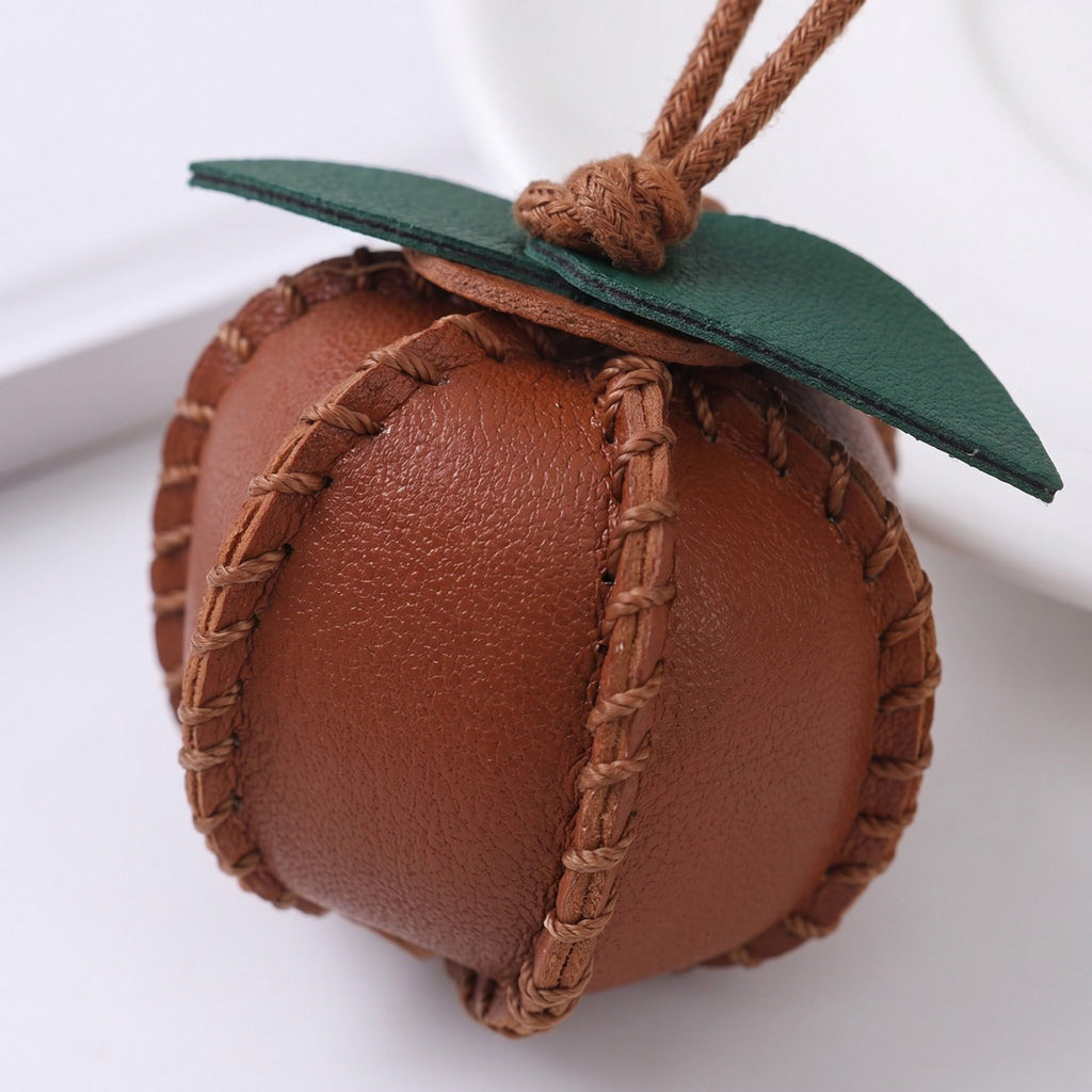 2-Piece Womens Faux Leather Bag Charm with Cord Loop Leaf Accent and Textured Stitch Detail