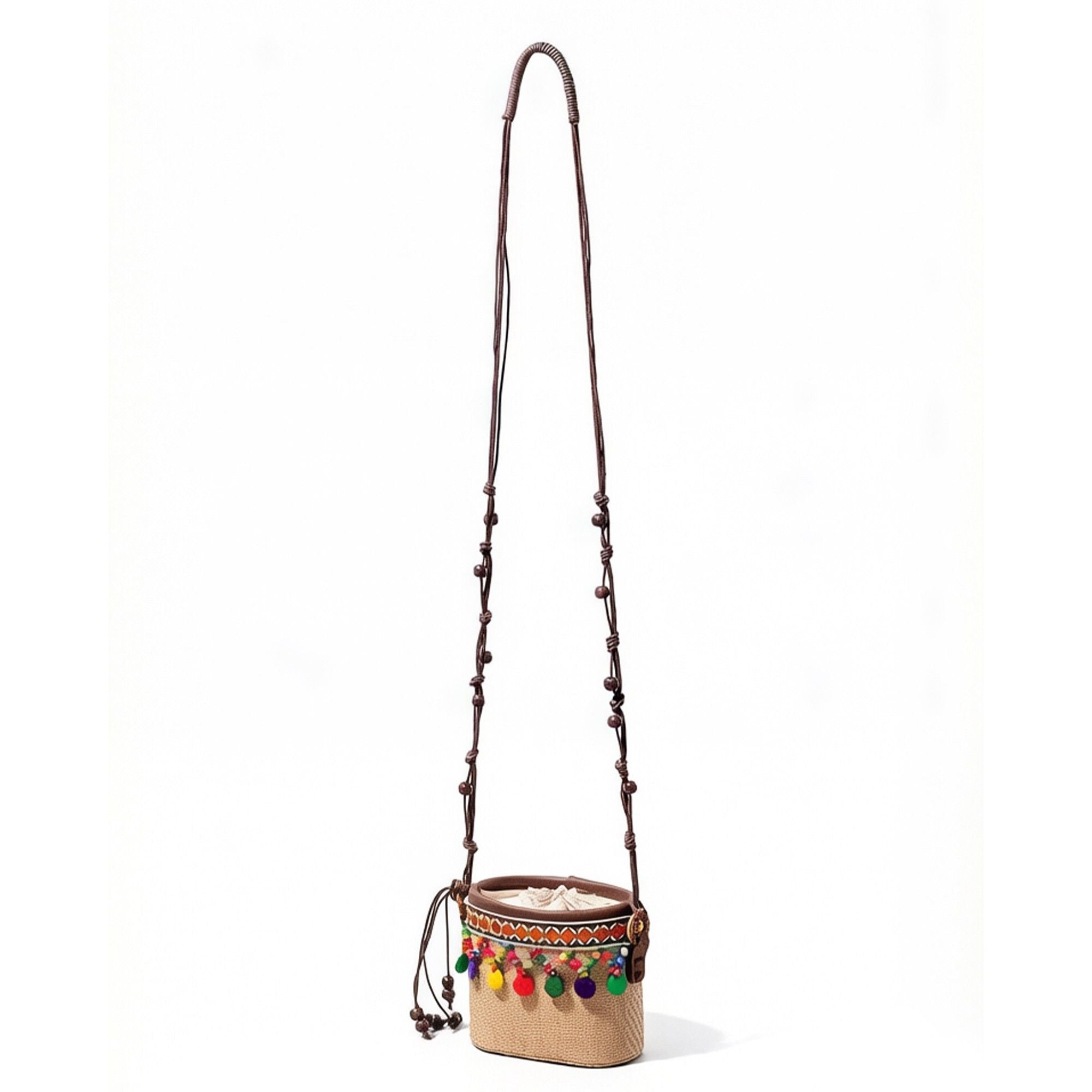 Woven Straw Mini Crossbody Bag with Tassel Detail Drawstring Closure Small Cylinder Handbag