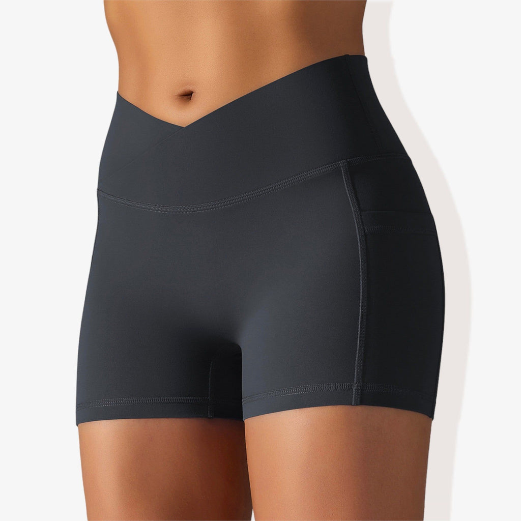 Pantalones cortos deportivos ajustados con cintura alta, bolsillos y banda en la cintura en forma de V