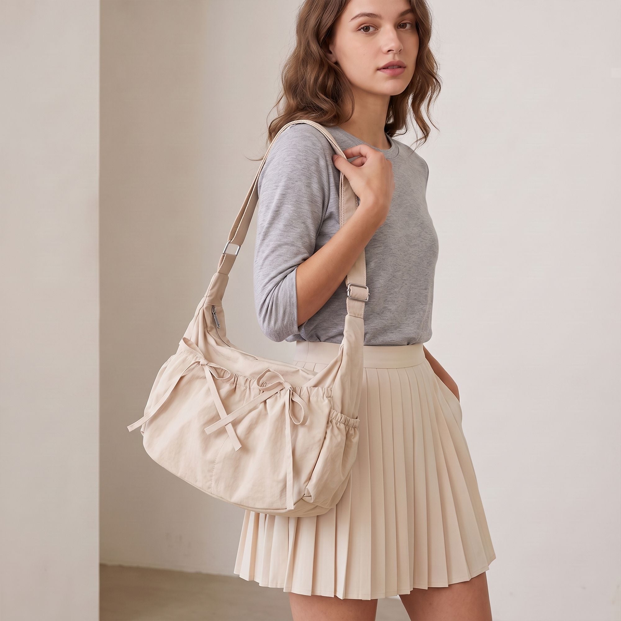 Lightweight Bow Detail Hobo Shoulder Bag with Adjustable Strap and Multiple Pockets