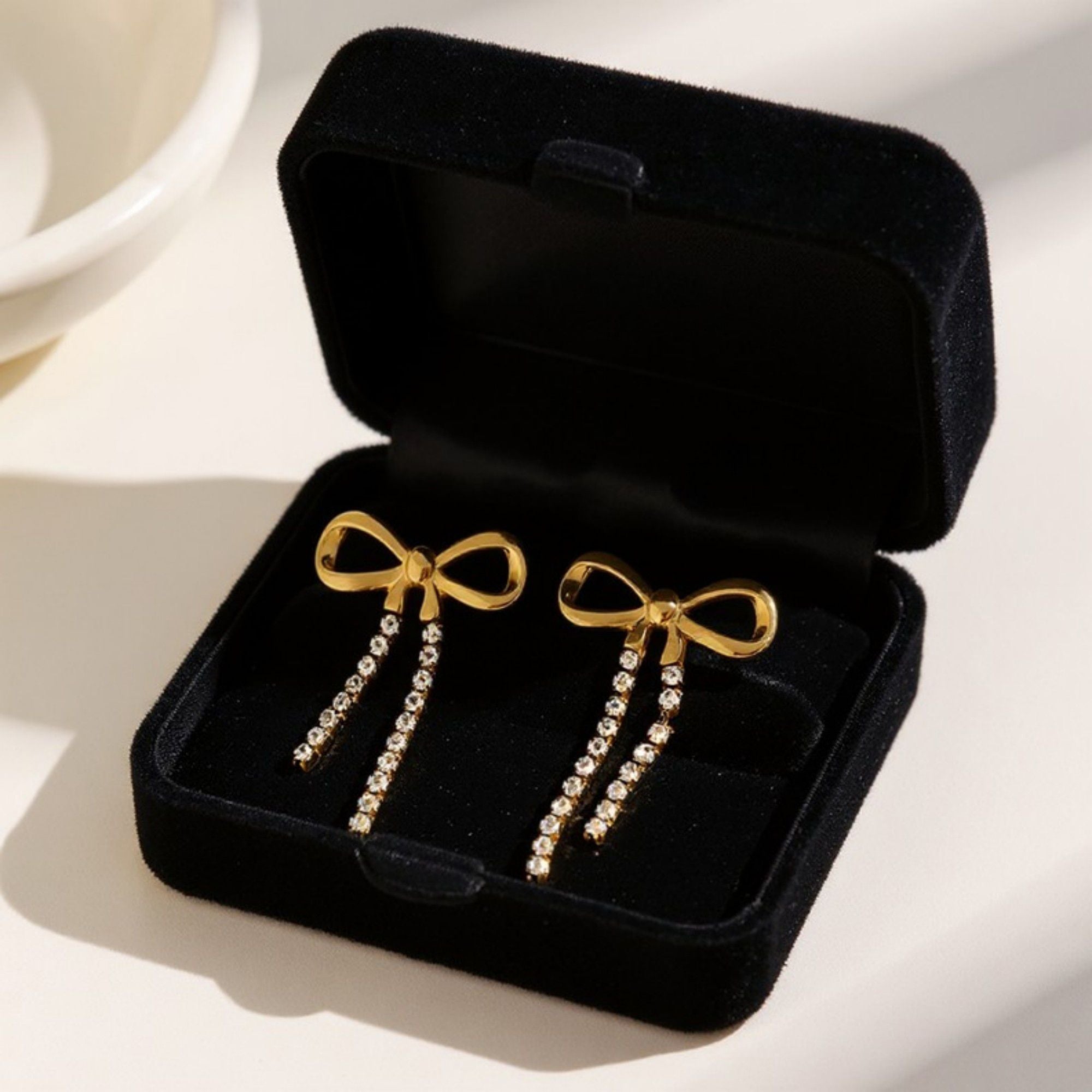 Bow Drop Earrings with Rhinestone Dangle Detail Feminine Statement Jewelry
