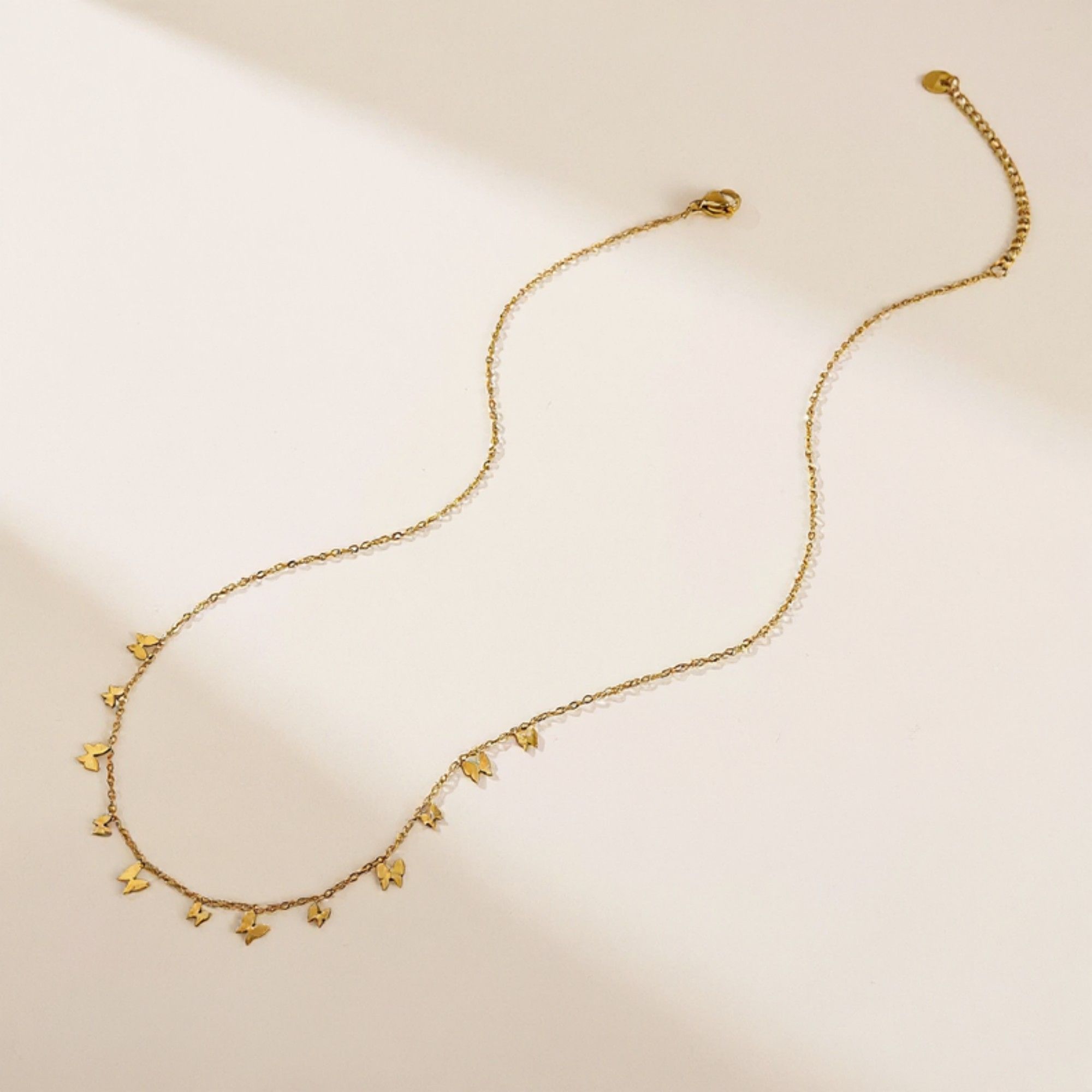 Butterfly Charm Necklace with Delicate Miniature Pendant Accents and Dainty Chain Design for a Soft Feminine Layered Look