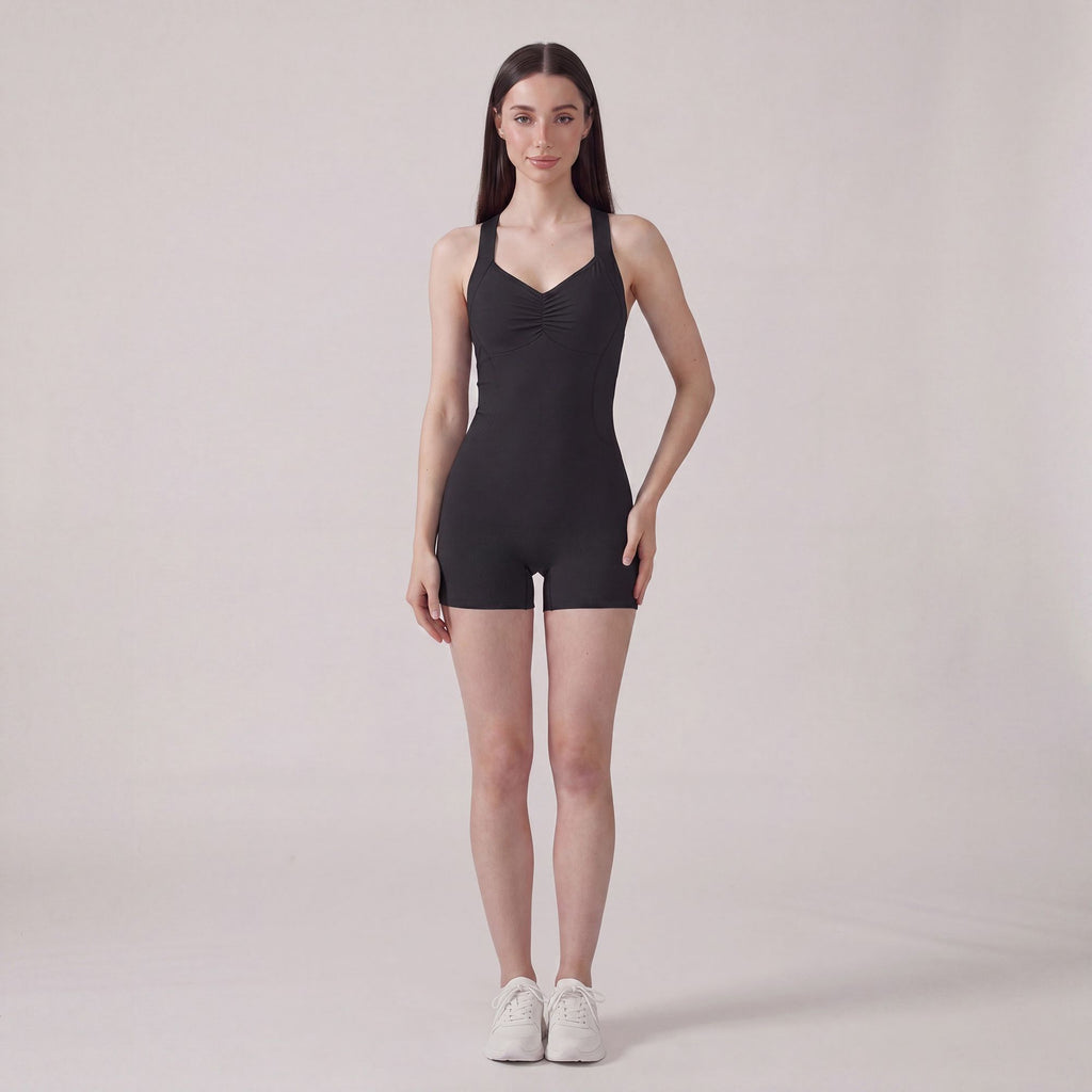 Sleeveless Active Romper with Cross Back Straps Ruched Bust Contour Seams and Fitted Shorts