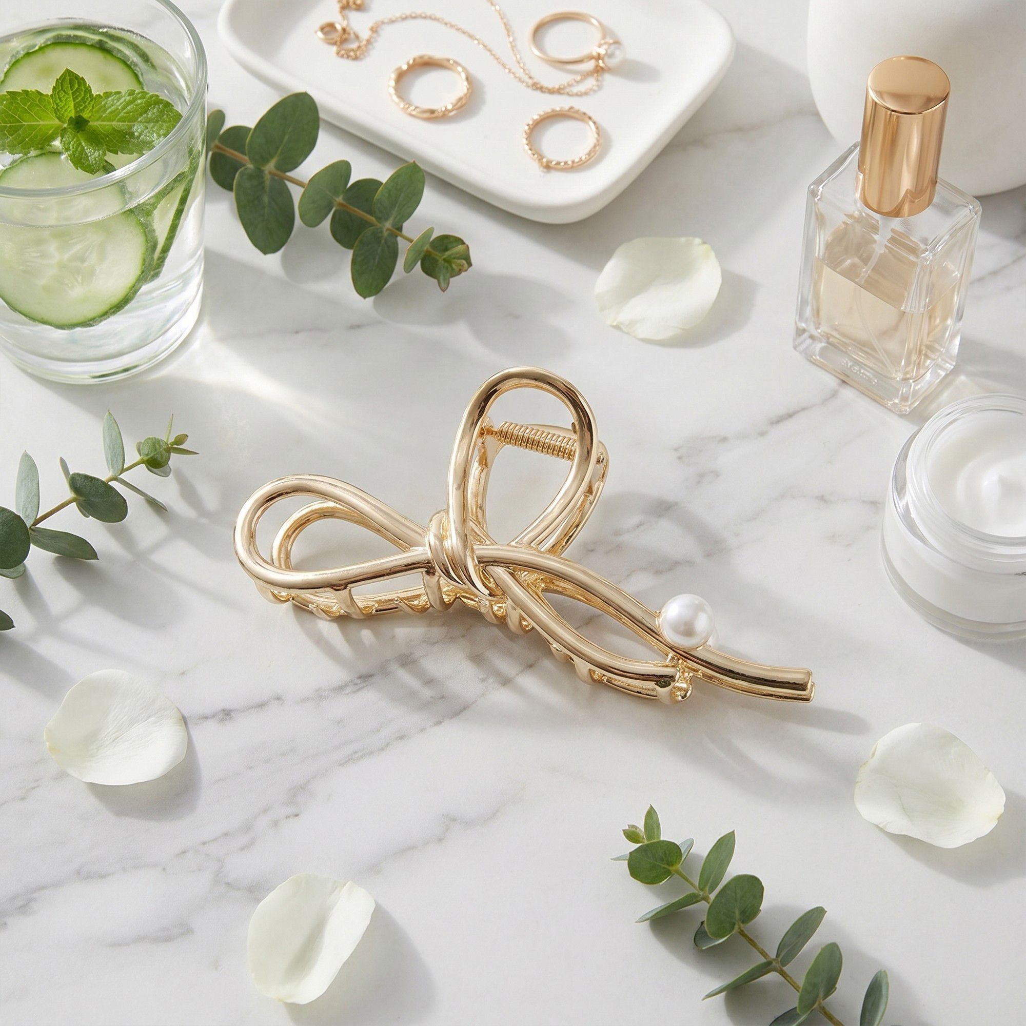 Bow Shaped Hair Clip with Faux Pearl Accent and Open Frame Design 4.5x1in