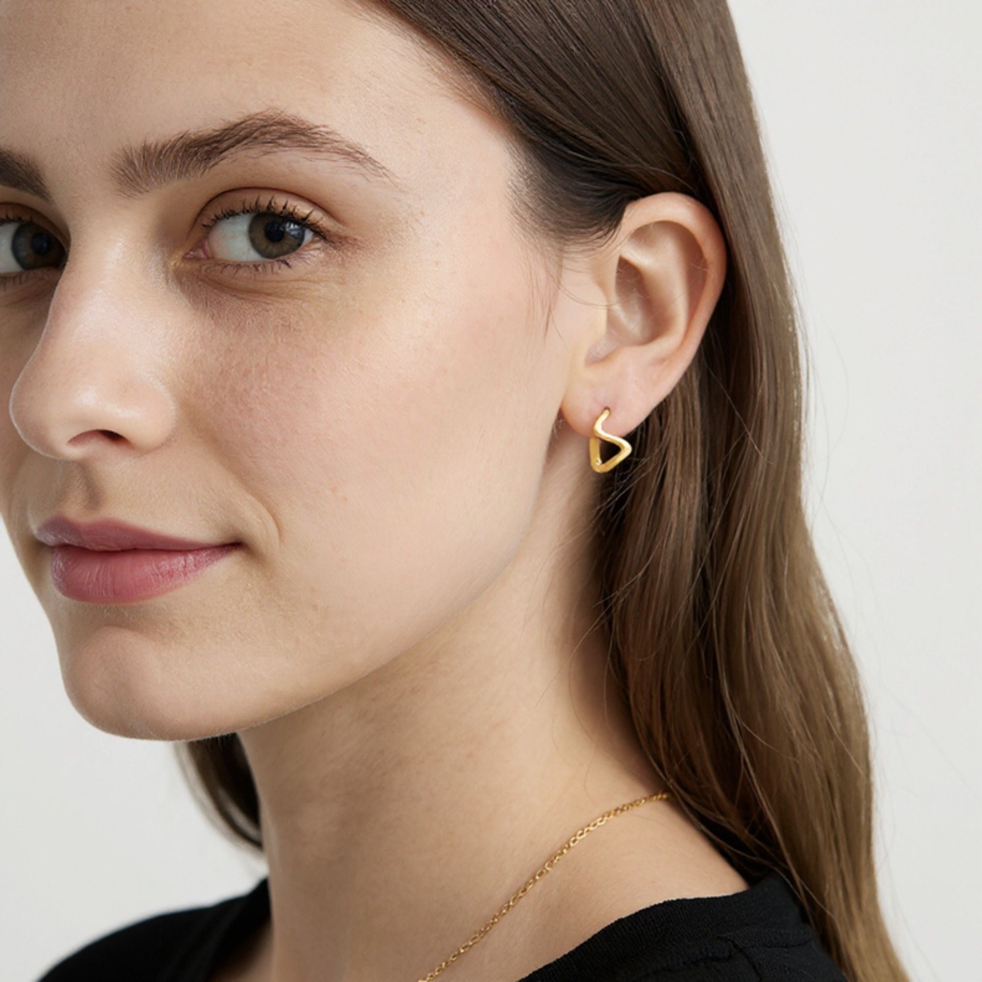 Women's Abstract Wave Hoop Earrings with Sculpted Curved Silhouette and Modern Minimalist Shape for a Sleek Contemporary Accent