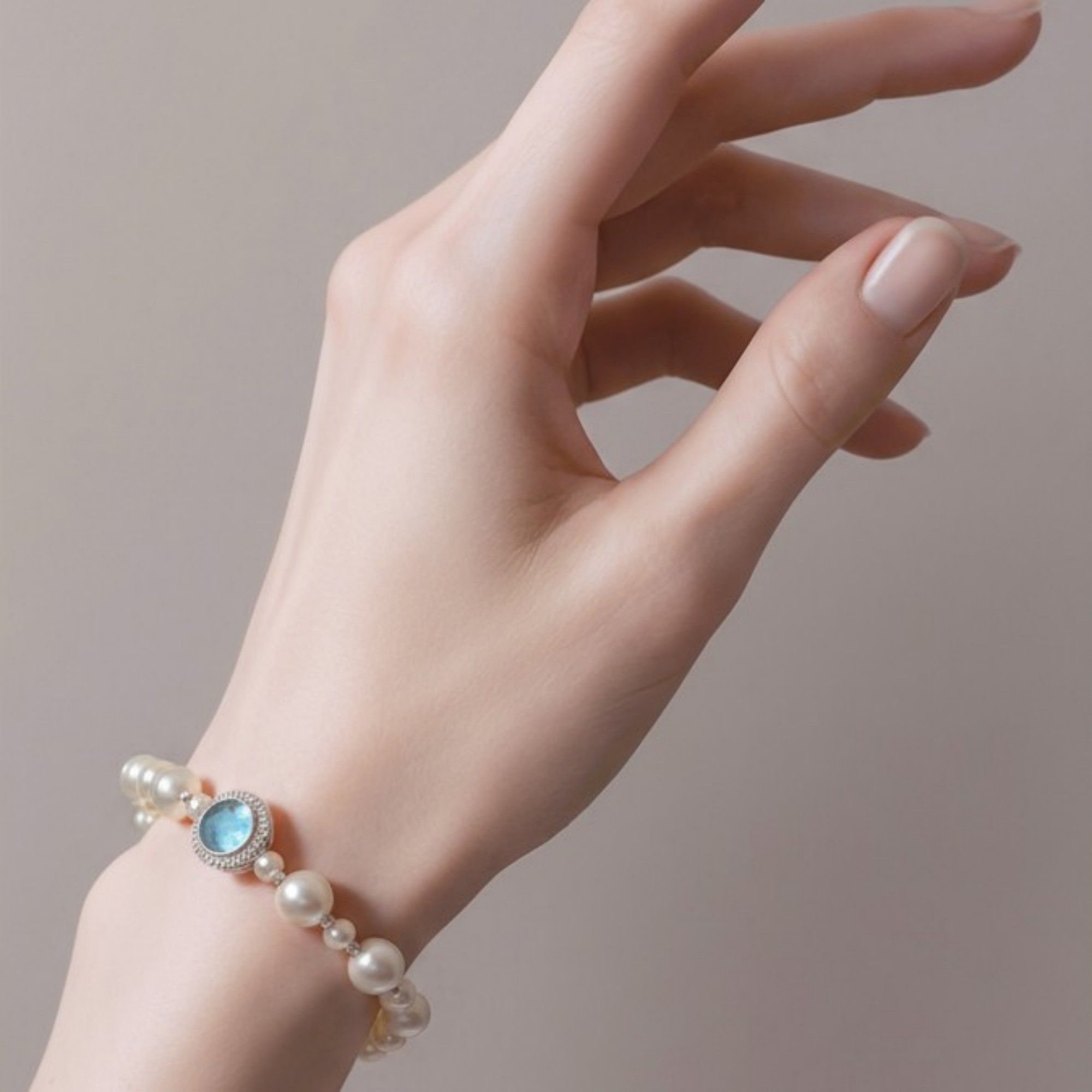 Women's Beaded Bracelet with Simulated Pearls and Aquatic Crystal Centerpiece
