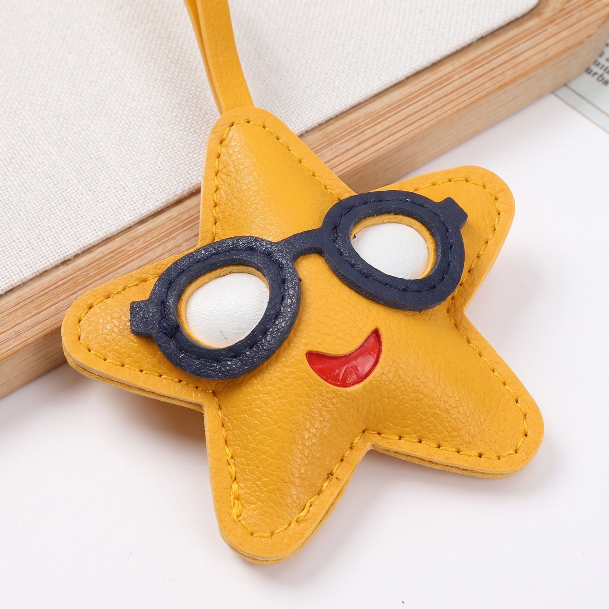 2-Piece Womens Faux Leather Bag Charm with Long Hanging Strap and Layered Detail
