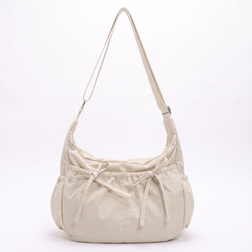 Lightweight Bow Detail Hobo Shoulder Bag with Adjustable Strap and Multiple Pockets