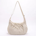 Lightweight Bow Detail Hobo Shoulder Bag with Adjustable Strap and Multiple Pockets