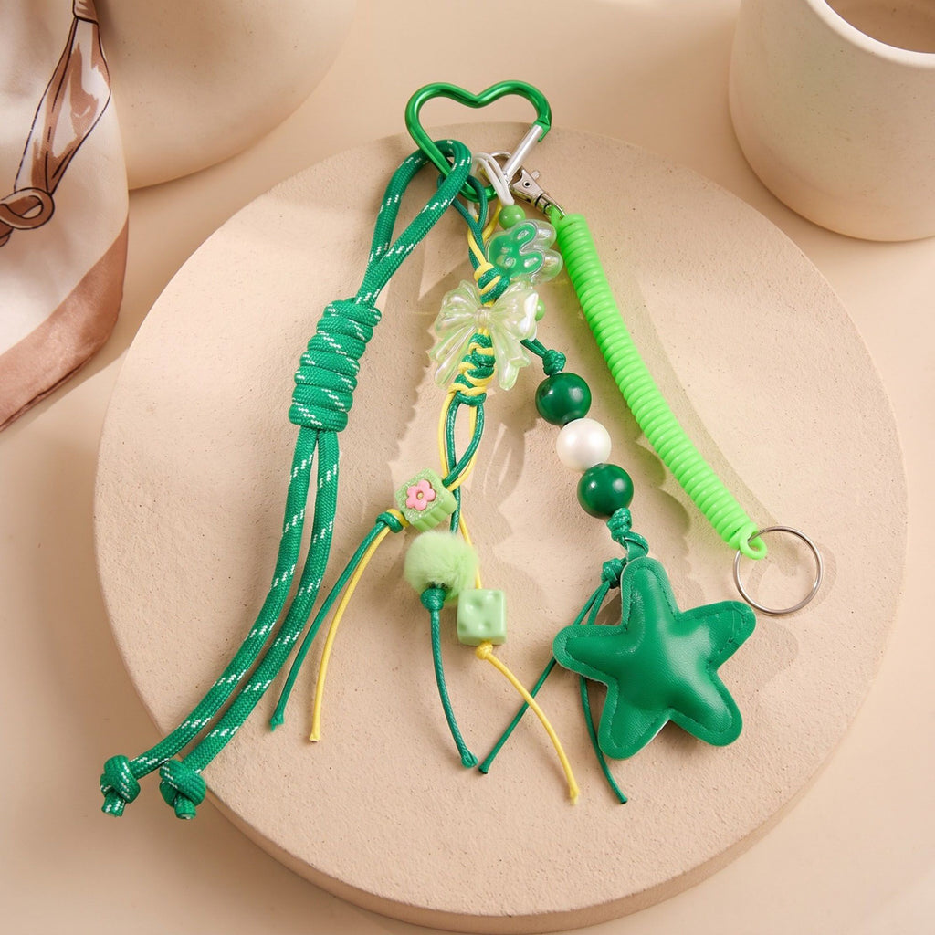 Multi-Element Bag Charm with Hanging Strap and Decorative Accents