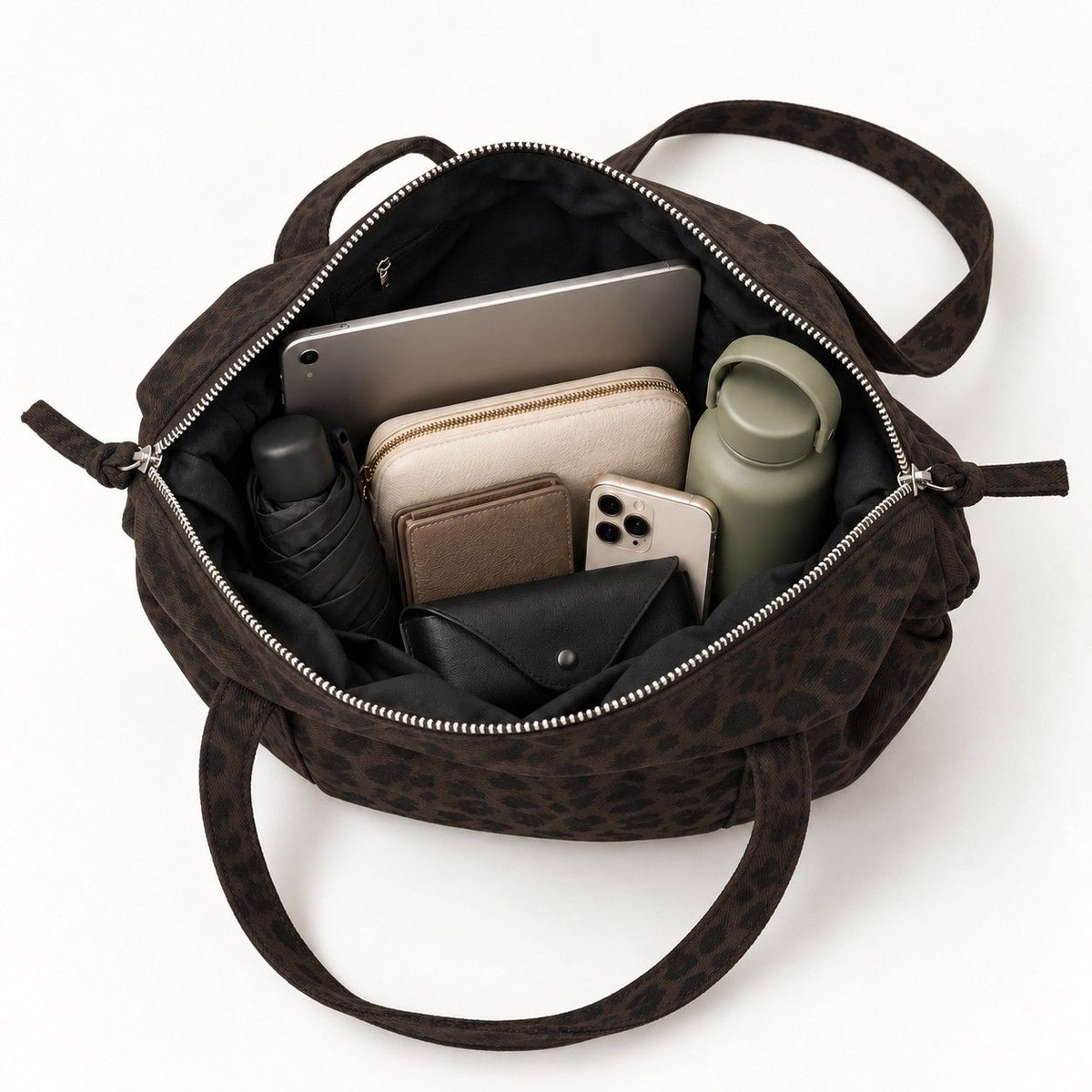 Leopard Print Barrel Shoulder Bag with Zip Closure and Interior Pockets