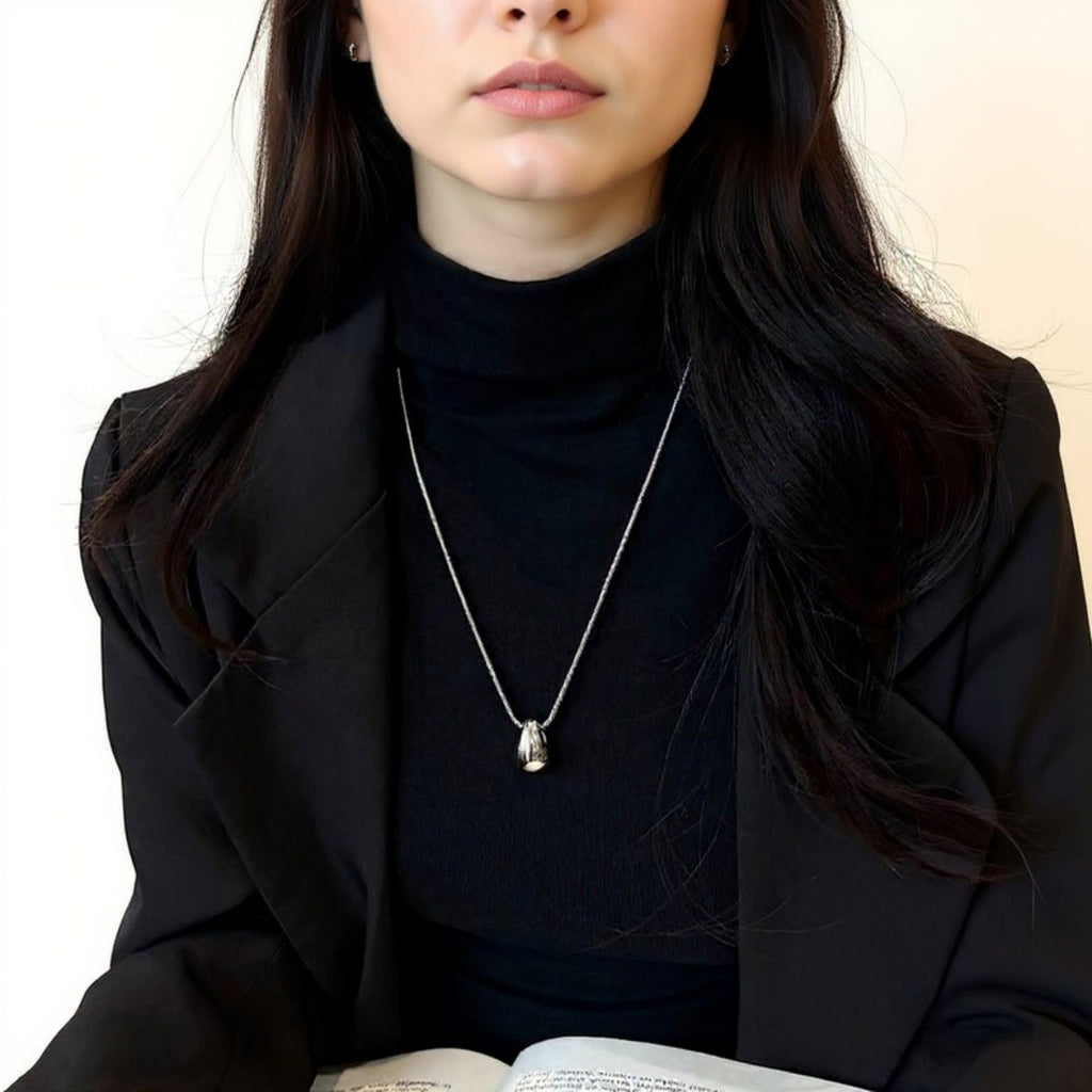 Women's Minimalist Teardrop Pendant Necklace with Polished Metal Finish