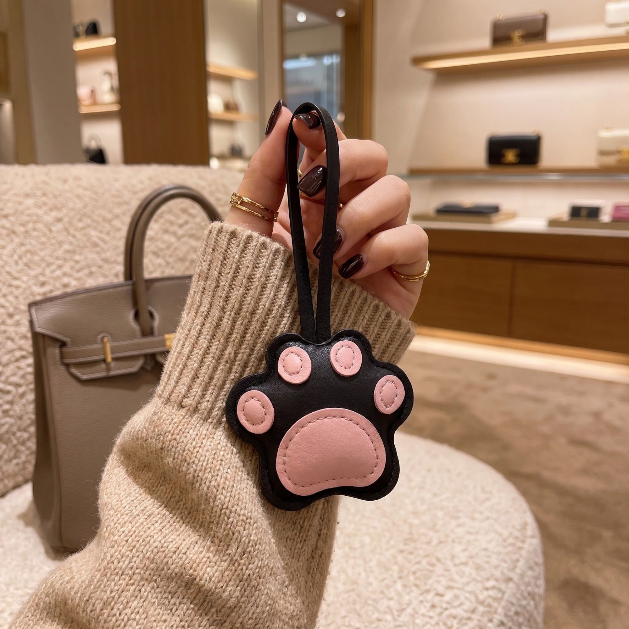 2-Piece Womens Faux Leather Paw Print Bag Charm with Long Hanging Strap and Padded Detail