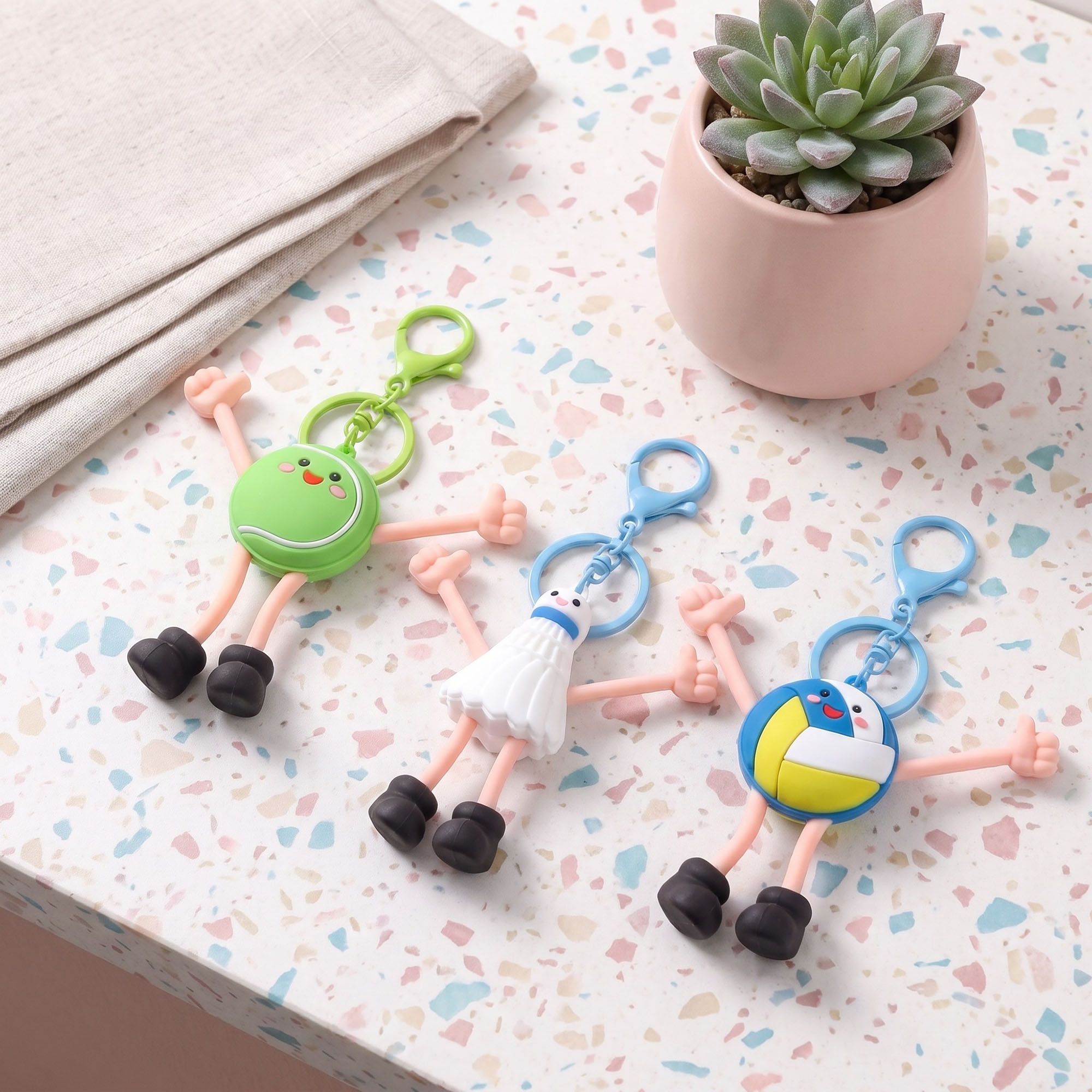 2-Piece Womens Sports Themed Bag Charm with Hanging Clip and Character Accent