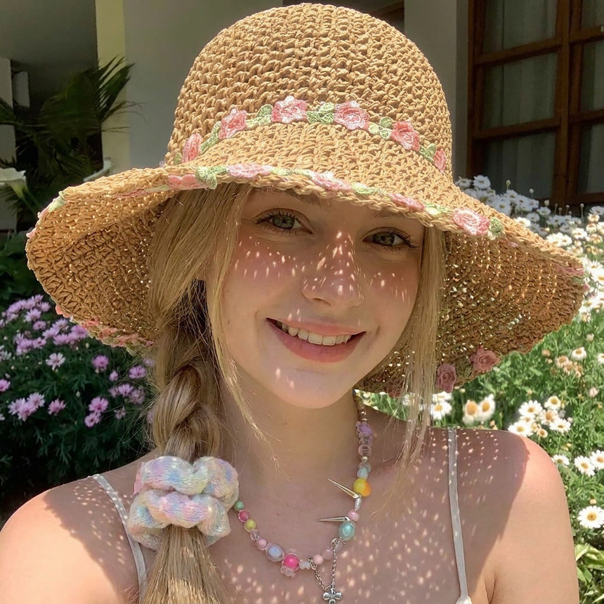Crochet Bucket Sun Hat with Floral Embroidery and Wavy Brim Design