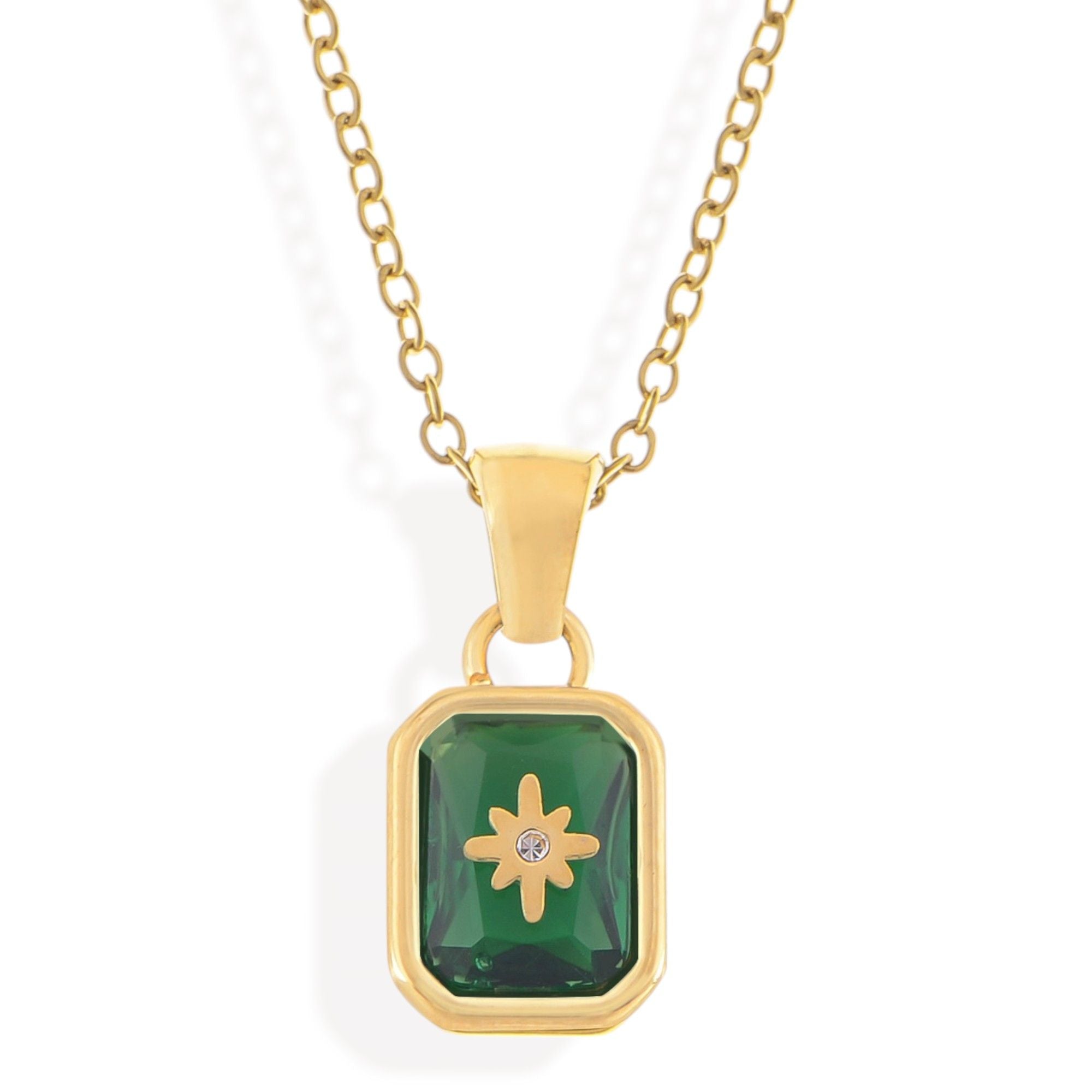 Gold Tone Pendant Necklace with Rectangular Crystal and Starburst Accent