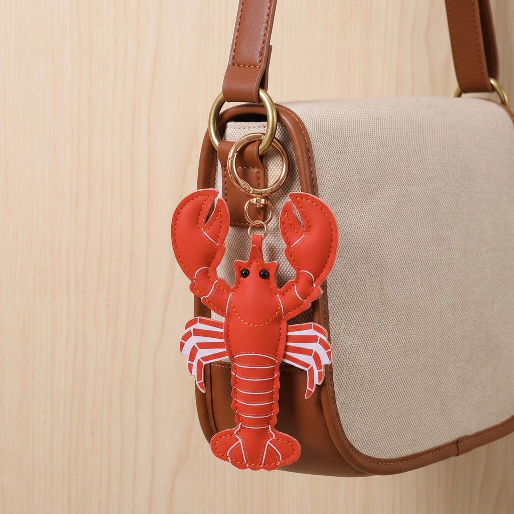 2-Piece Womens Faux Leather Padded Bag Charm with Gold Ring and Stitched Texture