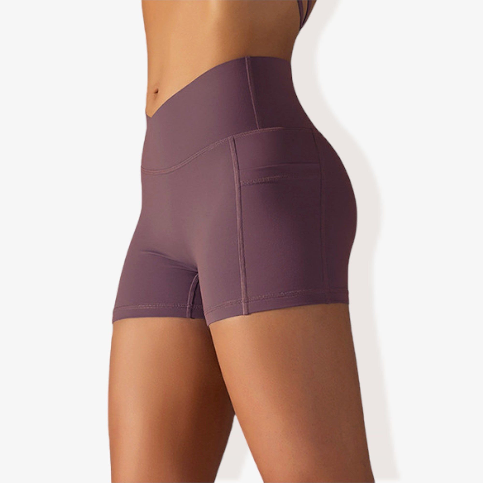 Pantalones cortos deportivos ajustados con cintura alta, bolsillos y banda en la cintura en forma de V