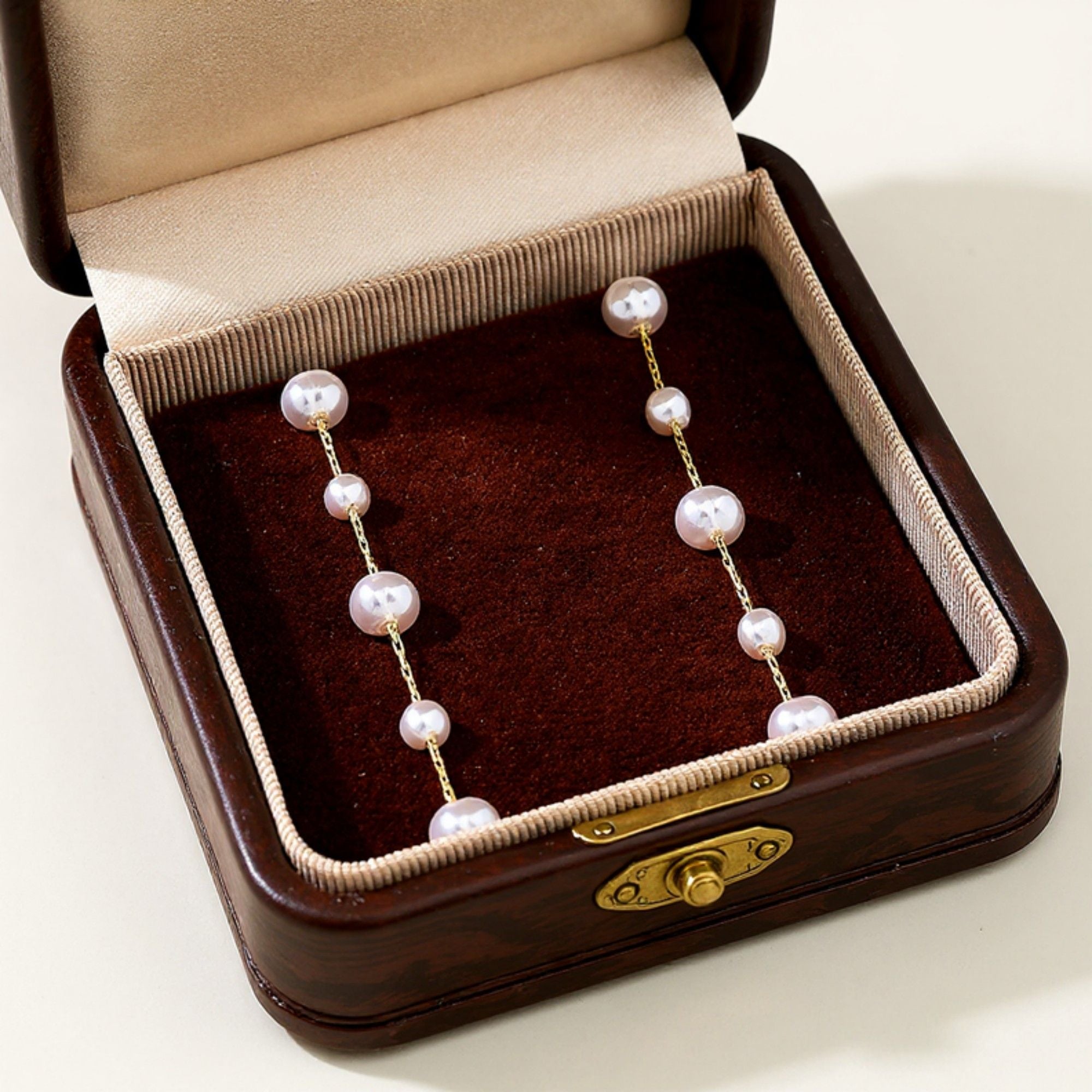 Pearl Drop Earrings with Delicate Chain Detailing and Graduated Bead Accents for a Soft Feminine Modern Elegant Accessory