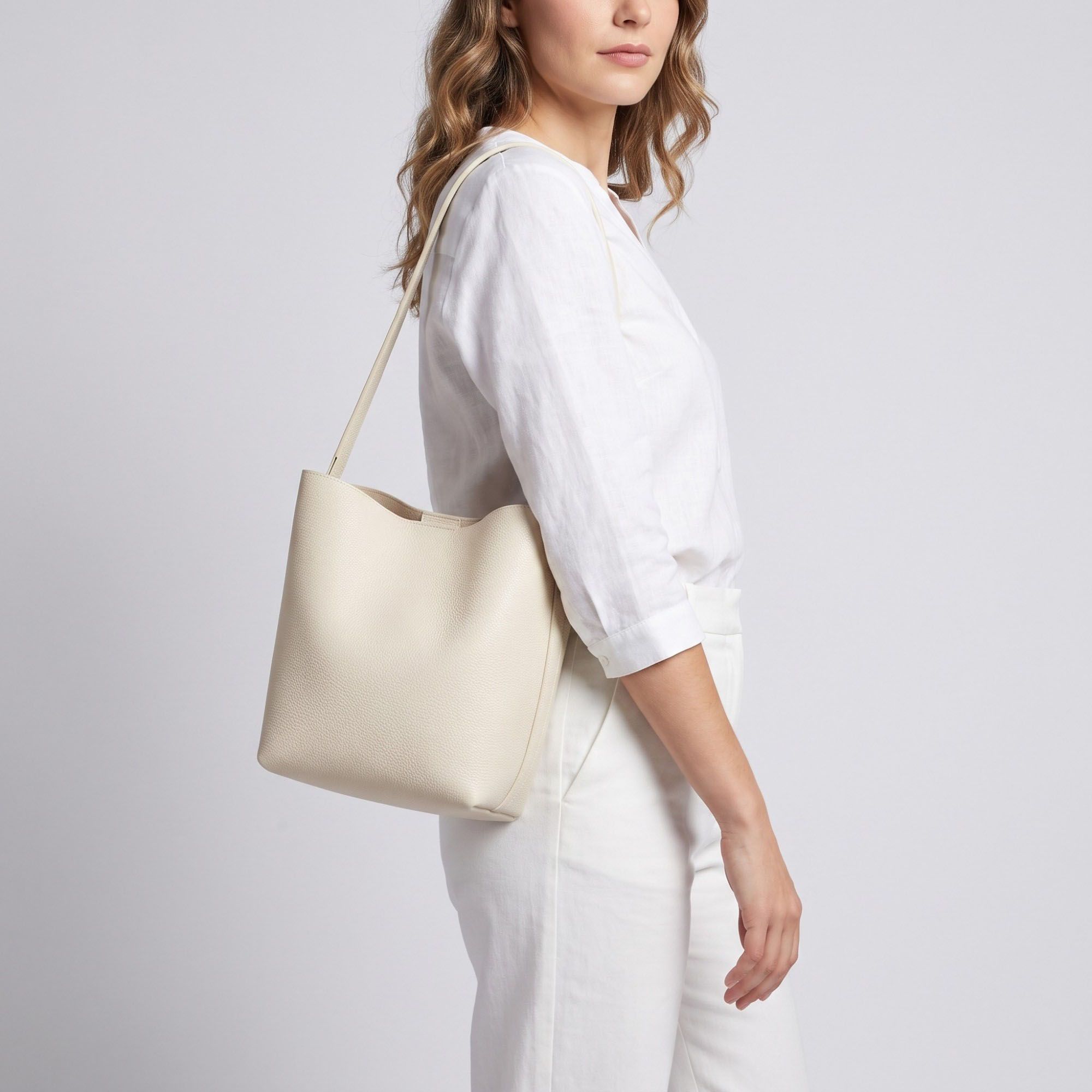 Textured Bucket Shoulder Bag with Long Strap and Soft Structured Silhouette 8.5x6.7x2.5in