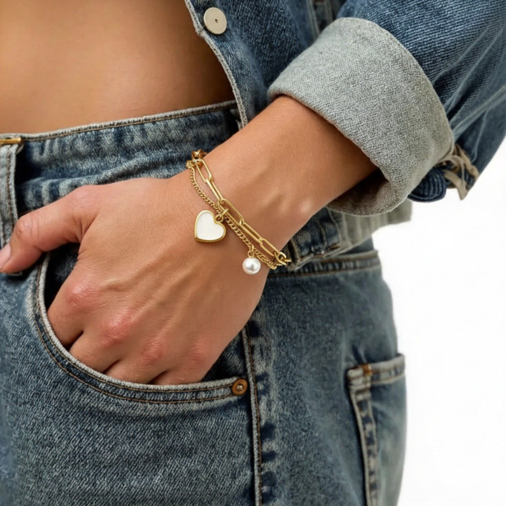Double Layer Chain Bracelet with Heart Charm Pendant and Smooth Bead Drop Detail for a Delicate Feminine Layered Look