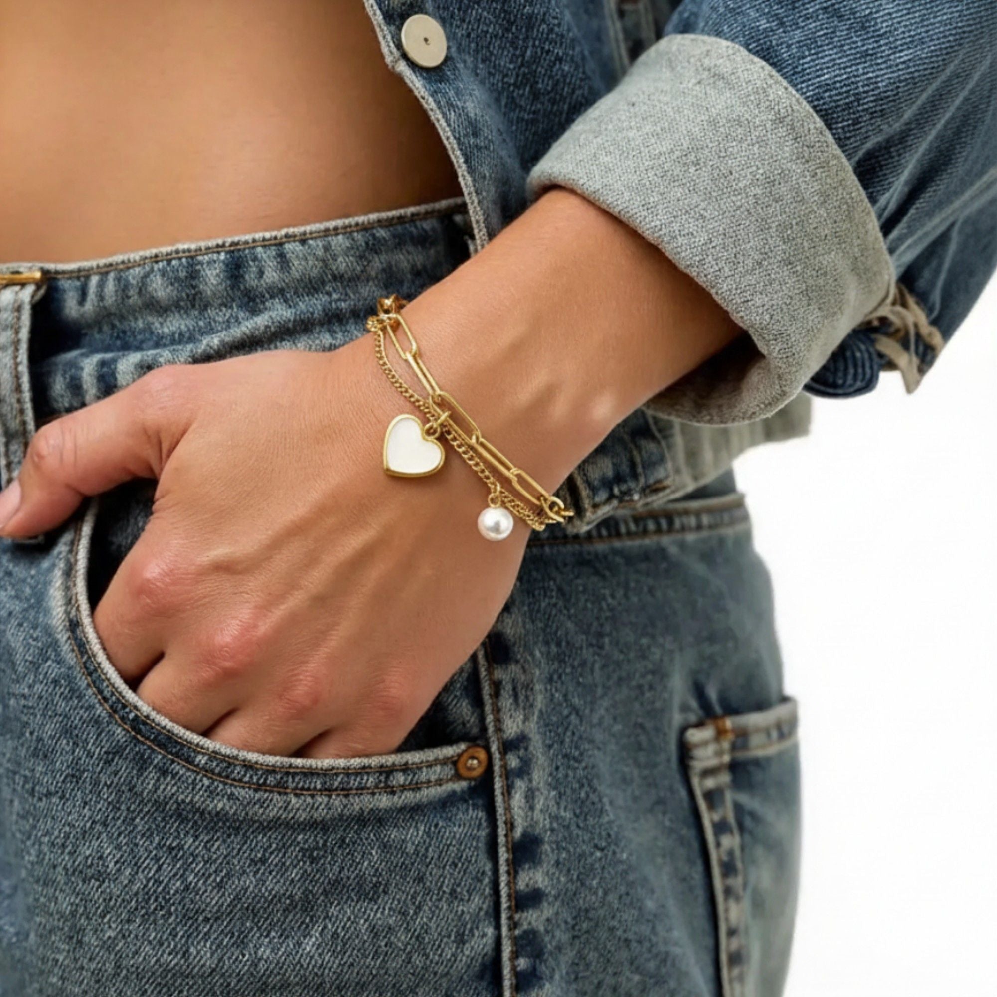 Double Layer Chain Bracelet with Heart Charm Pendant and Smooth Bead Drop Detail for a Delicate Feminine Layered Look