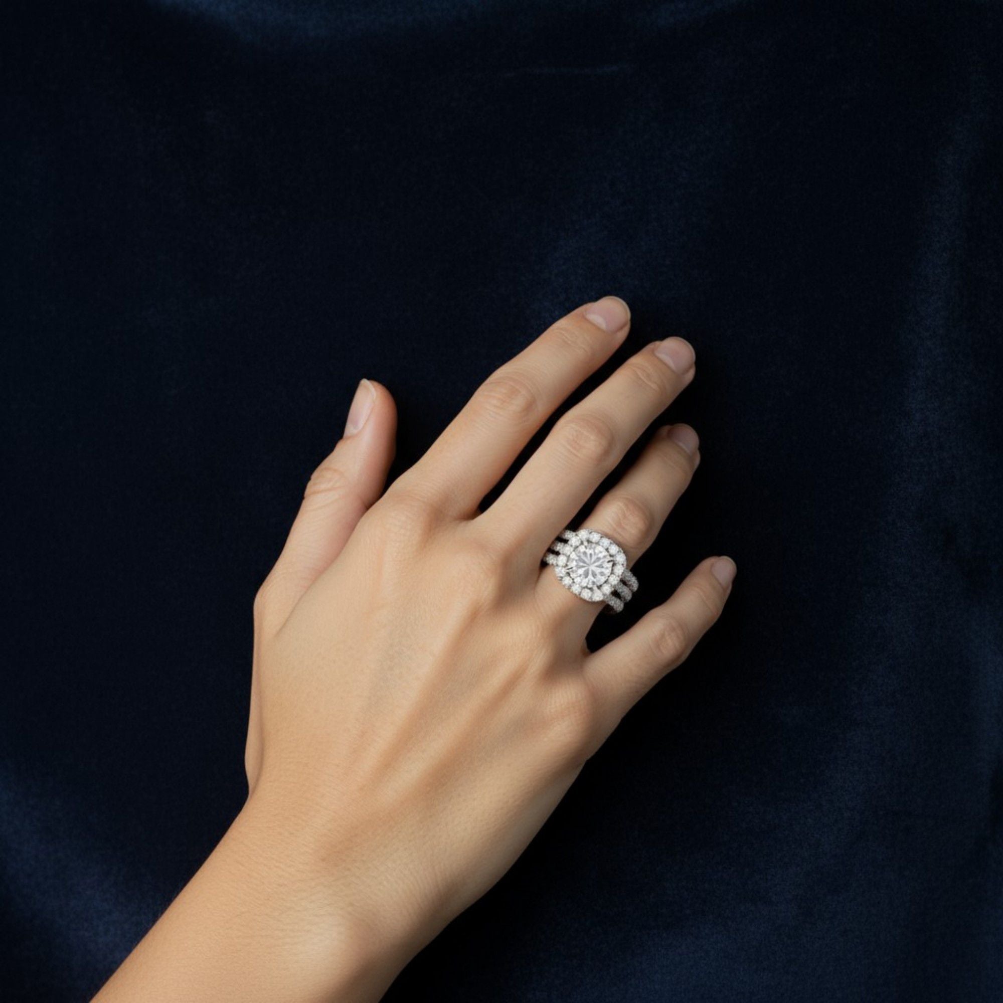 Women's Cushion Halo Engagement Ring with Round Cut Center Stone and Triple Band Design